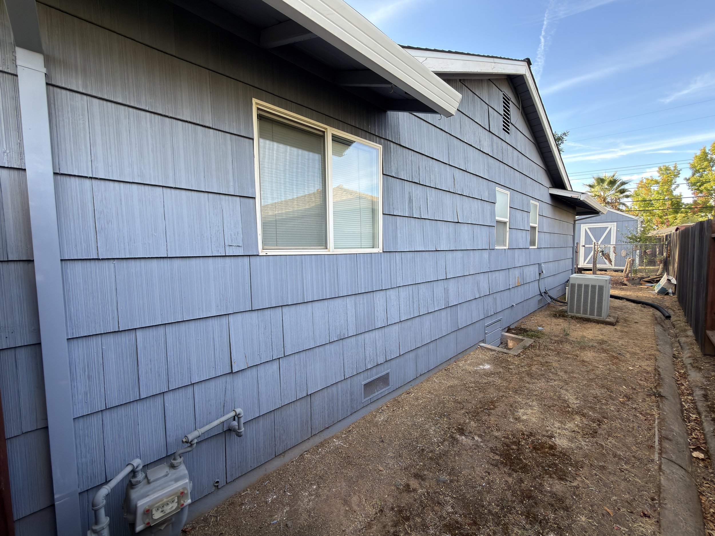 wood shingle siding before james hardie lap siding replacement