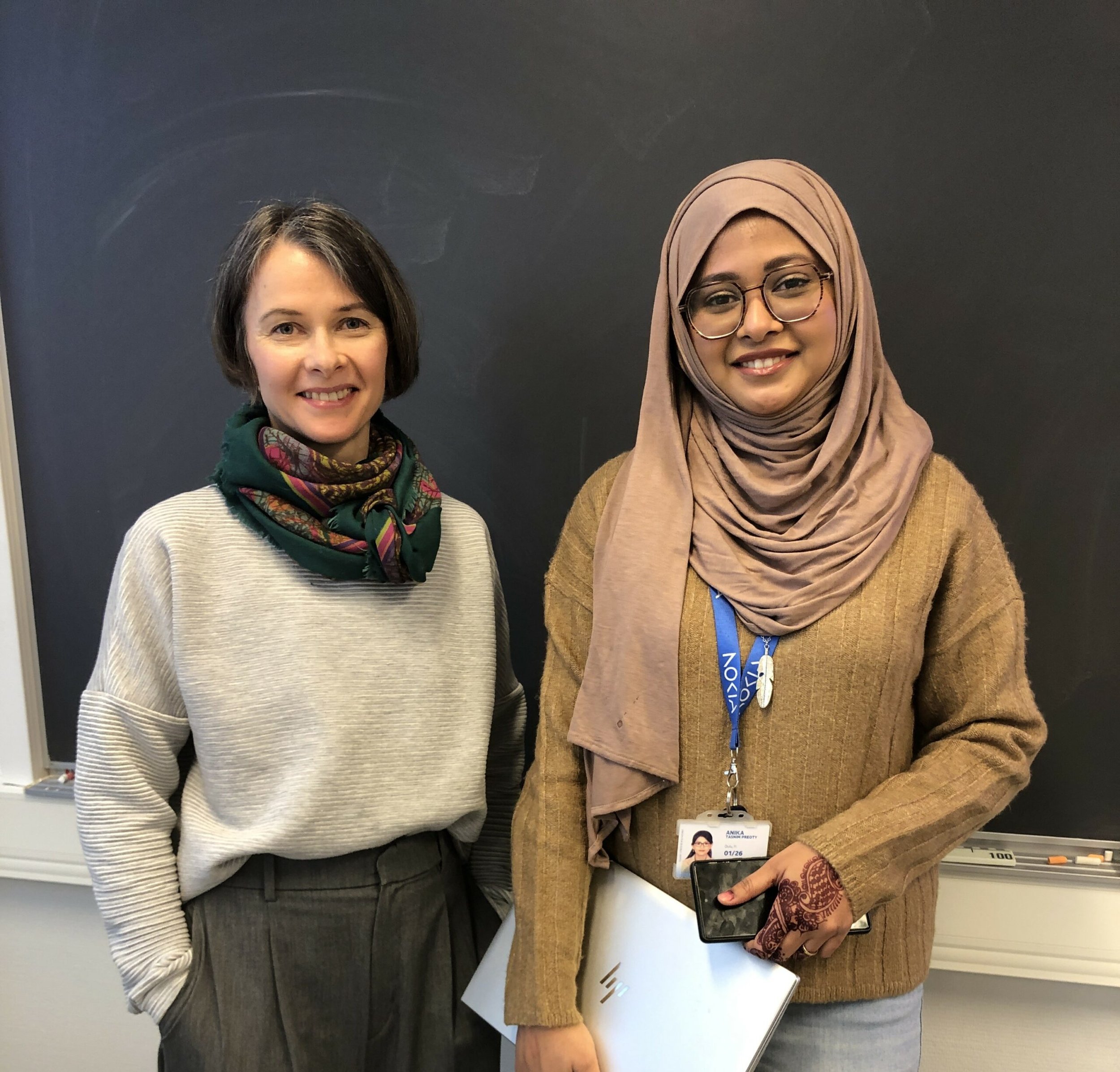 Women collaborating to enhance AI for everyone