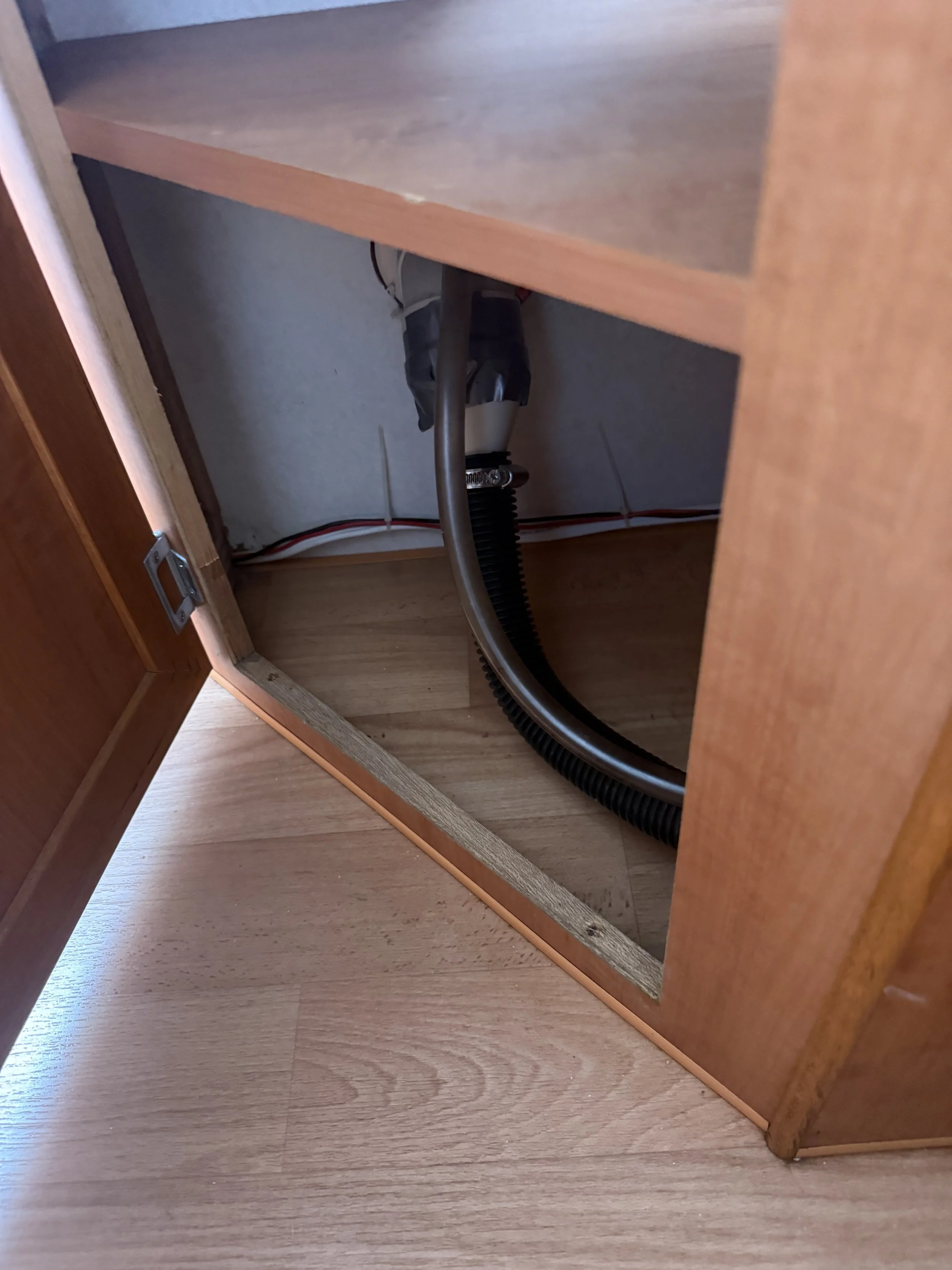 Caravan water inlet repair and plumbing maintenance.