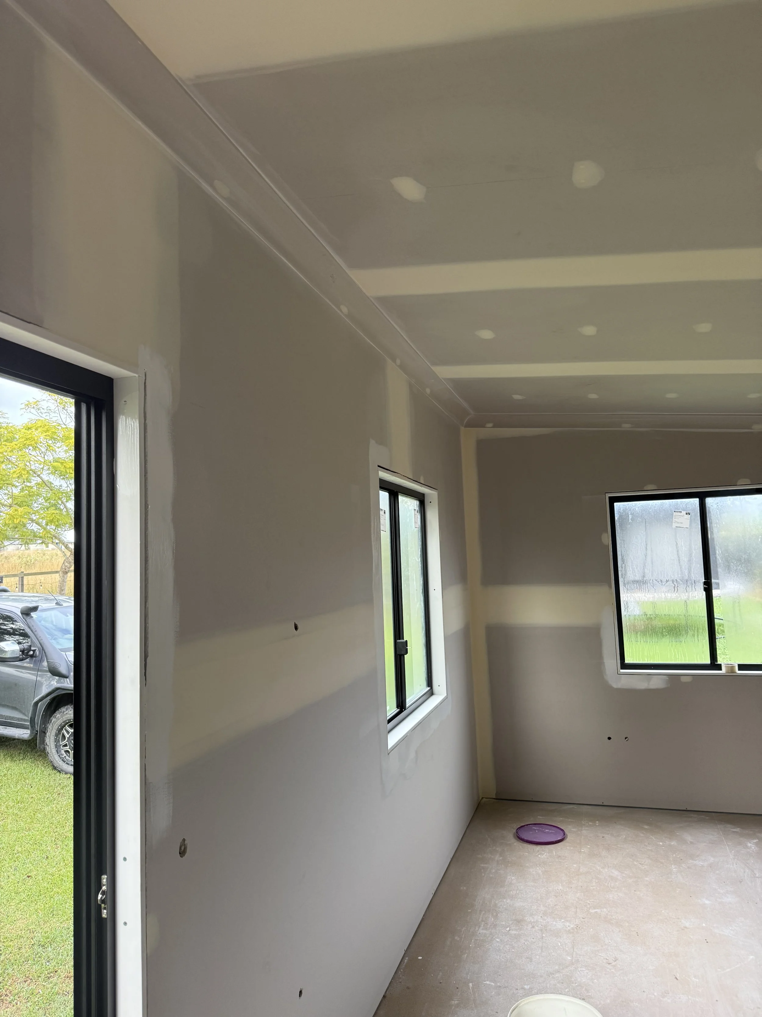 Tiny home interior preparation and udercoating prior to final painting and finishing.