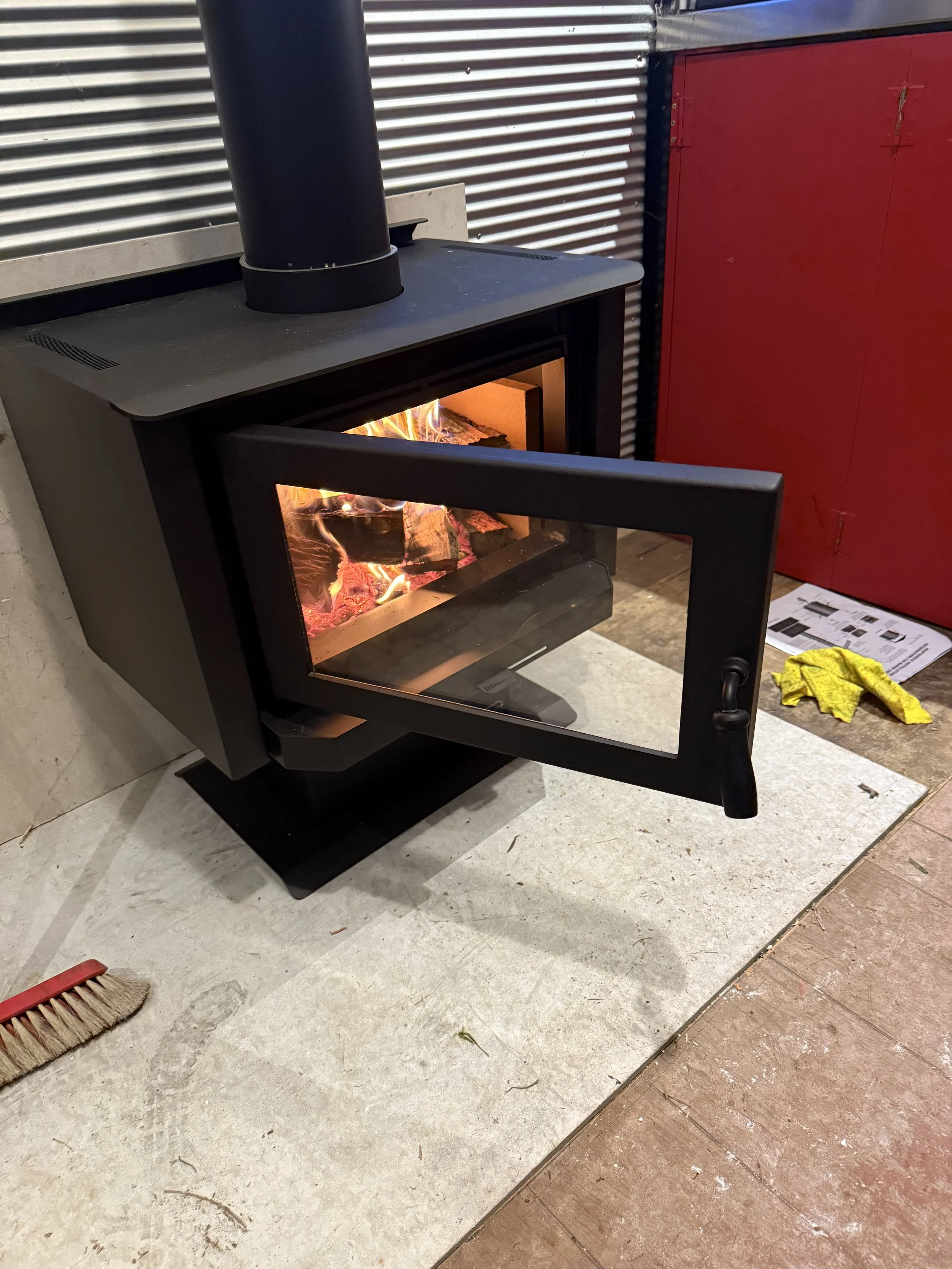Freestanding wood heater installation and improvement work for homes and rural properties.