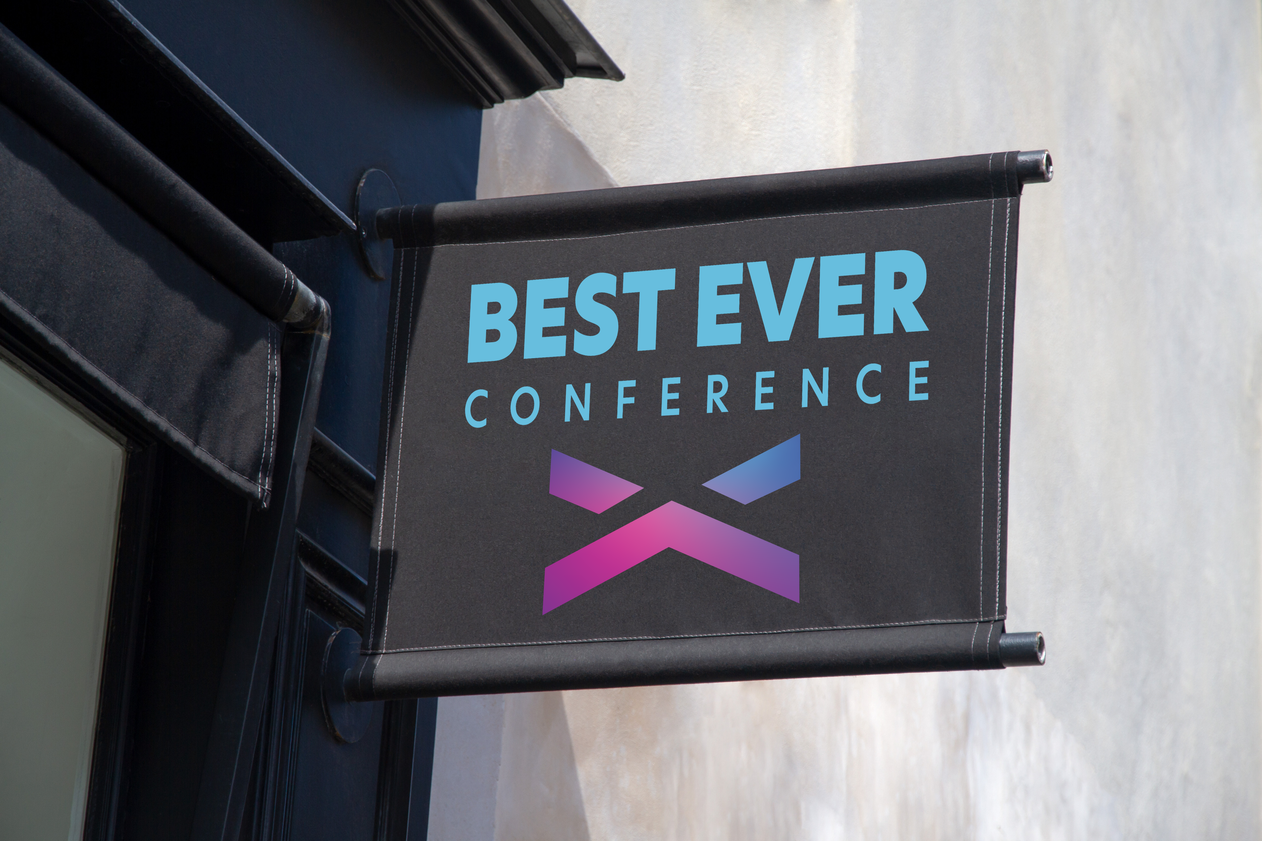 The logo concept mocked up as a blade sign — testing how the identity would hold in a physical, exterior environment. Scale changes everything about whether a mark works.