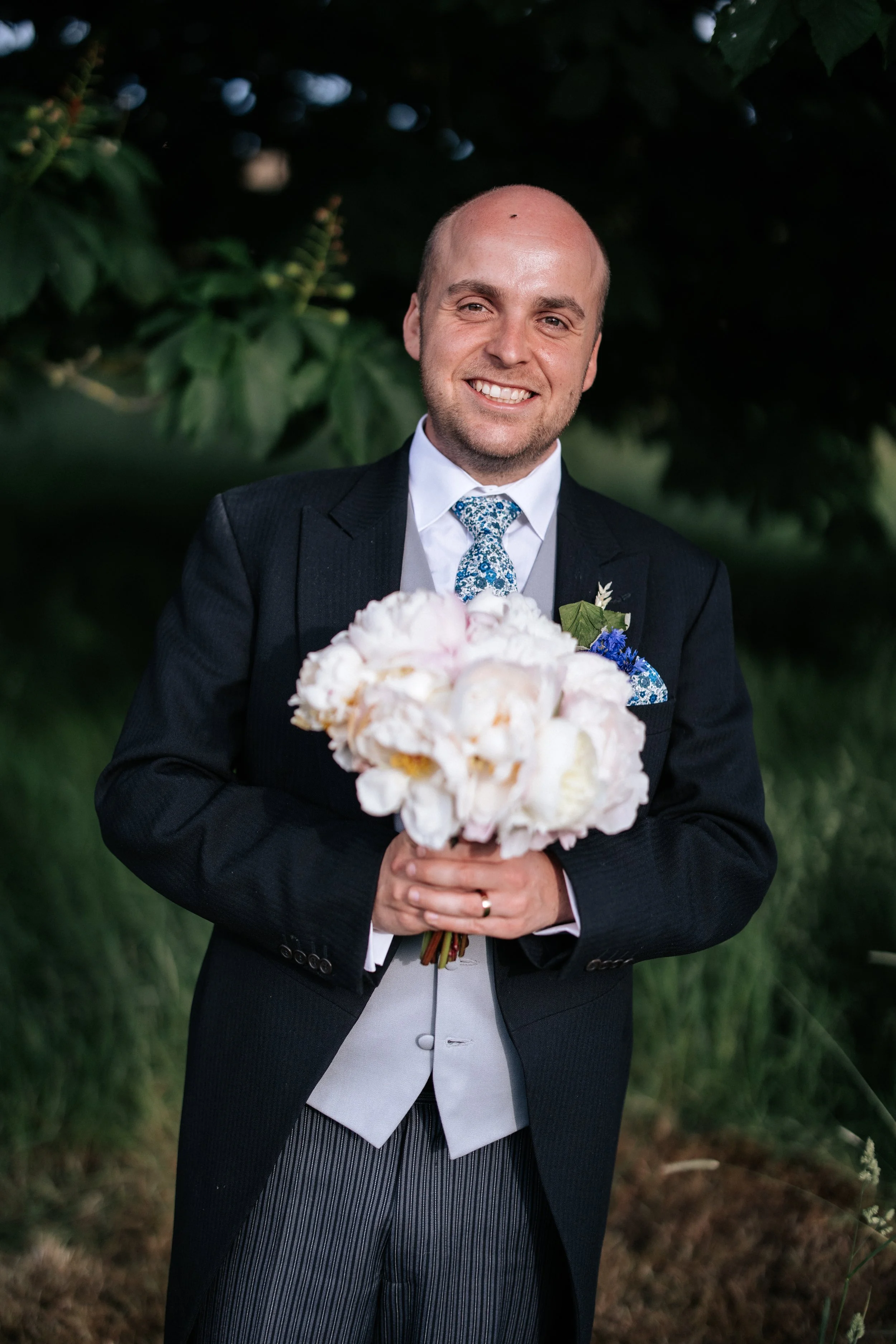 Groom with Bridal Bouquet