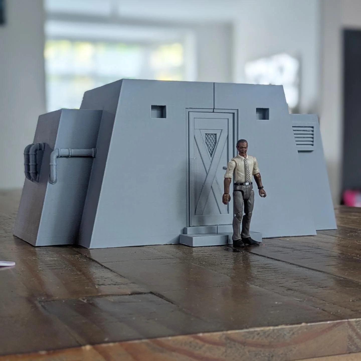 The final prototype for the Utility shed. Scaled up slightly to better accommodate figures inside. Seen here modelled by my man Ray Arnold. 

Added a removable power generator,.computer desk, interior ceiling detailing to the roof panel and reorganis
