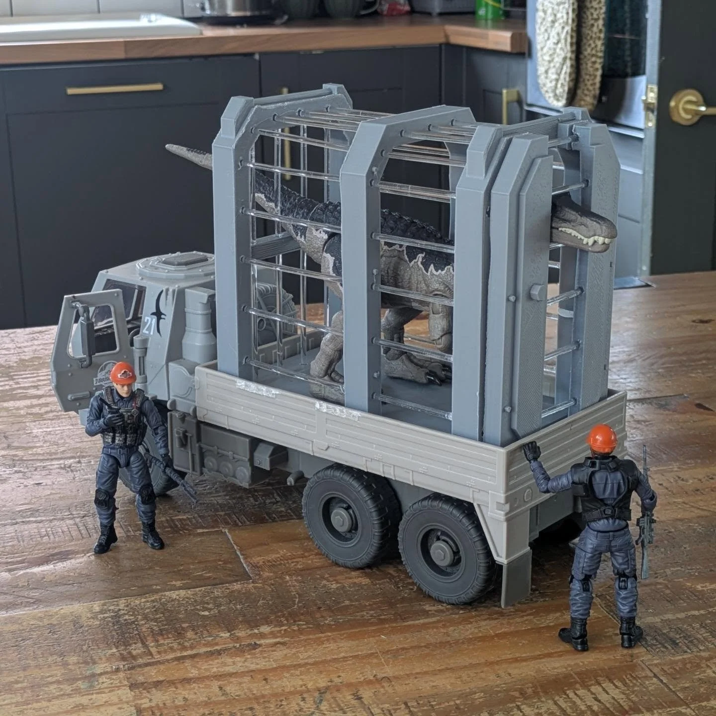 Capture cage for the JW truck.

One for you JP/JW collectors today!

I designed a capture cage kit to sit on the bed of the JW truck. It has a removable door (magnetised) and feature 3mm Acrylic rods as the bars, to prevent your Dino's breaking out ?