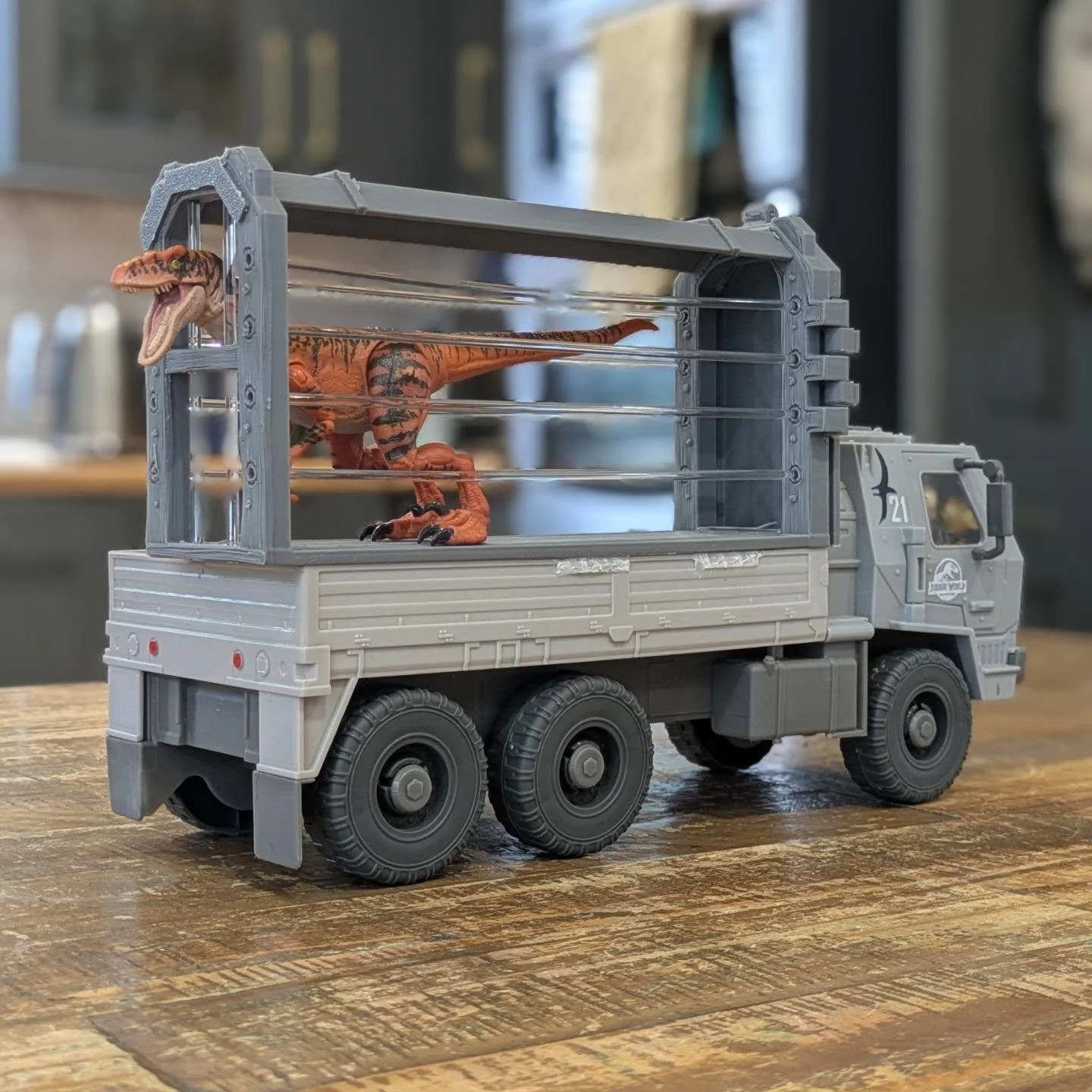 The resized small #carnivore containment cages. Designed to fit two abreast on the back of the #jurassicworld transport truck toy.

The hinges on these have now been side-mounted to be a better space-saving method than the previous vertical opening c