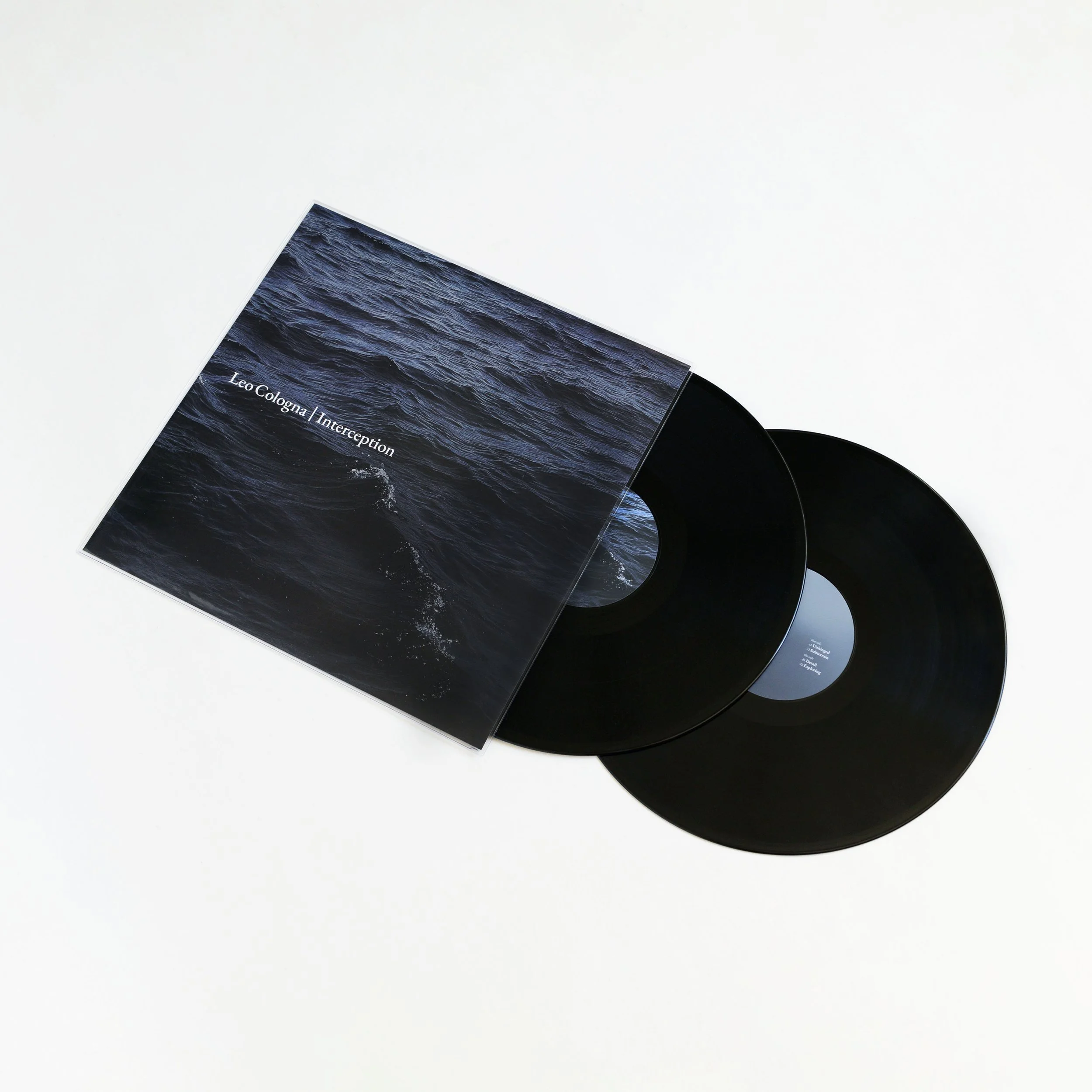 Record album with cover art showing dark water, partially visible vinyl records, and the text 'Leo Cologne / Intercept'.