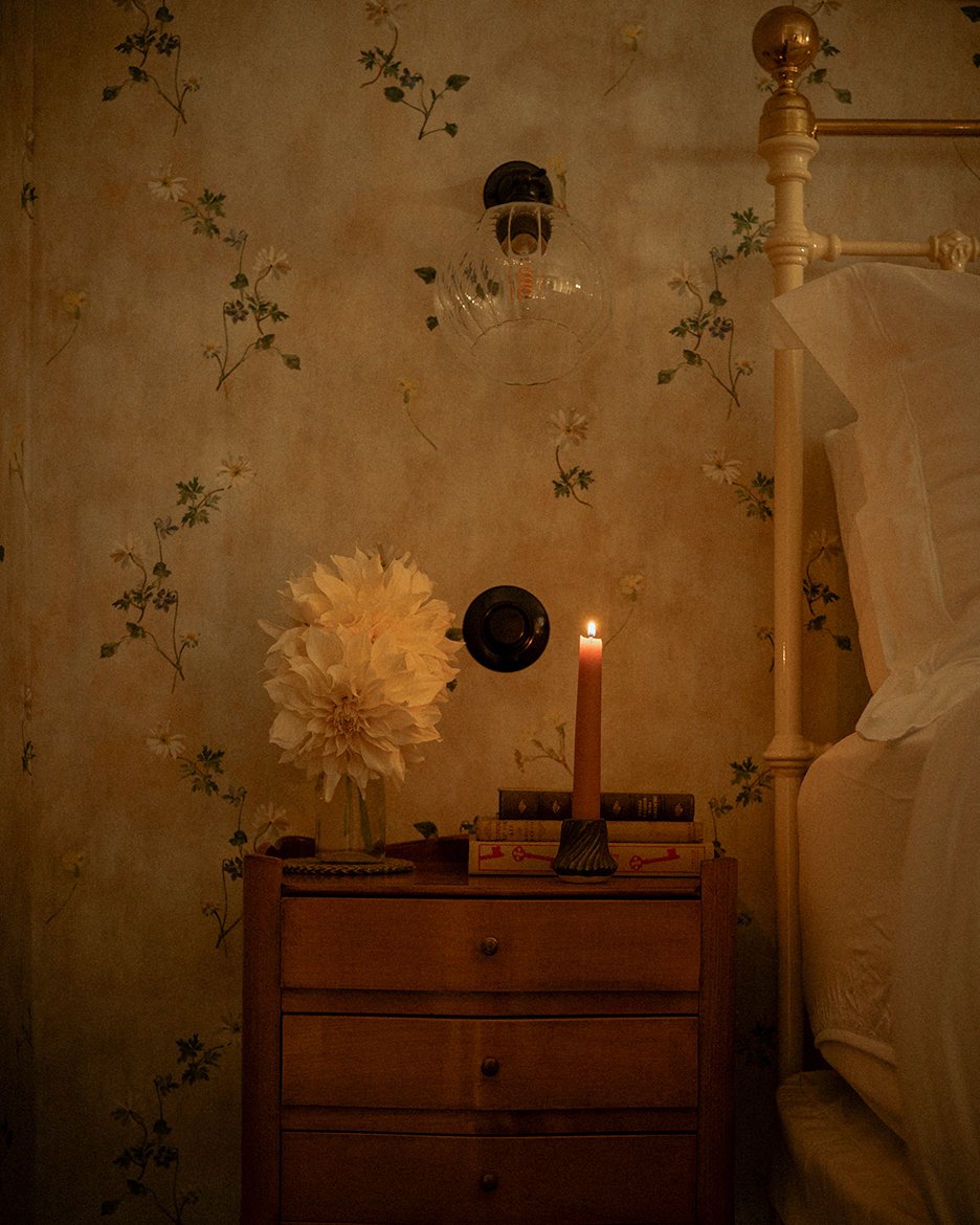 Candlelit front bedroom, Flint Cottage, a luxury holiday cottage in the South Downs National Park, East Sussex.