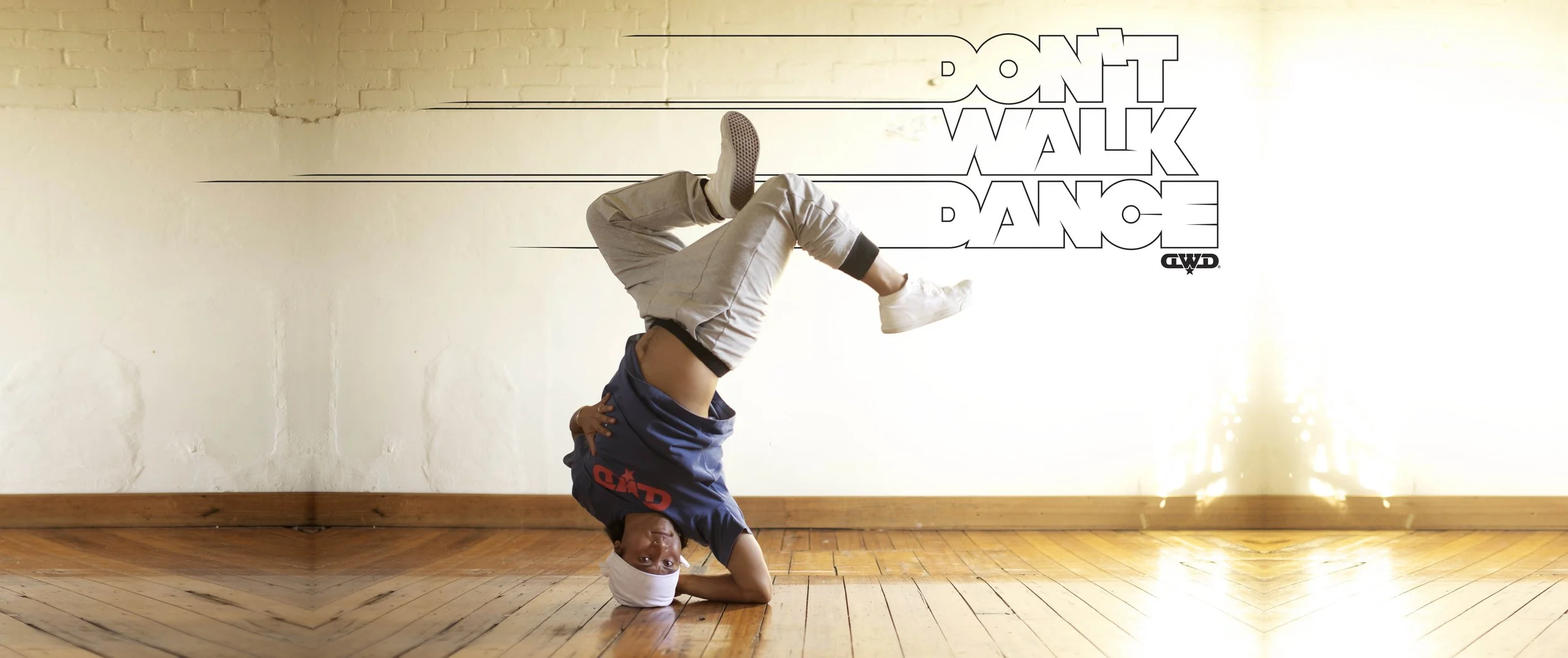 head stand w logo_high res_extended.jpg