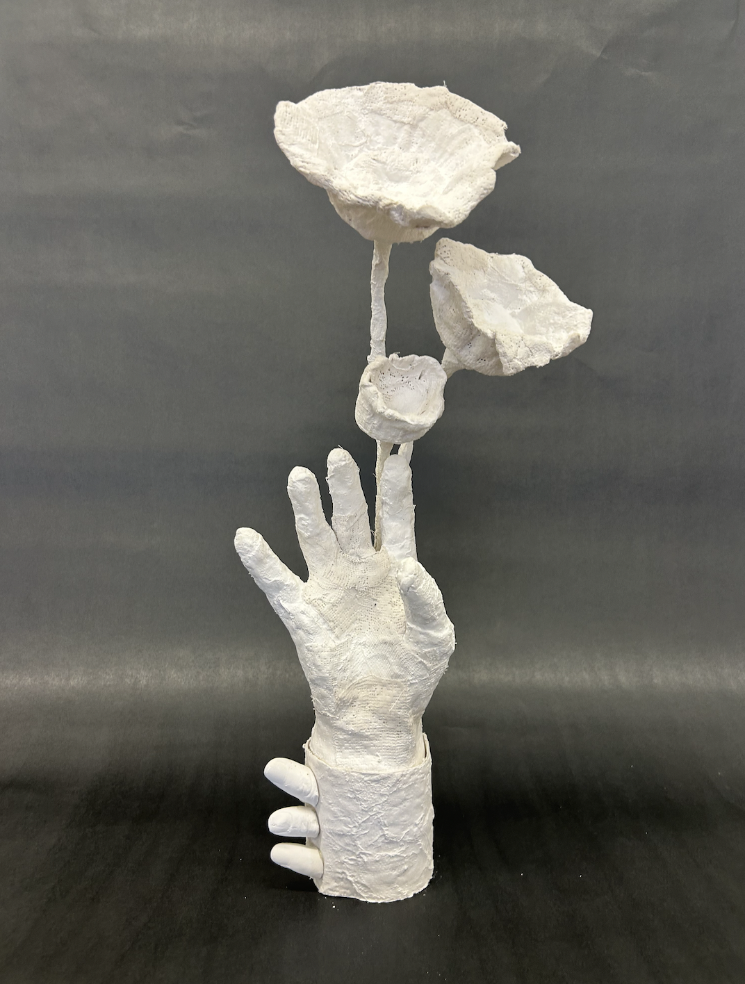 Reach. Plaster, paper. 4 x 4 x 16 in. 2023