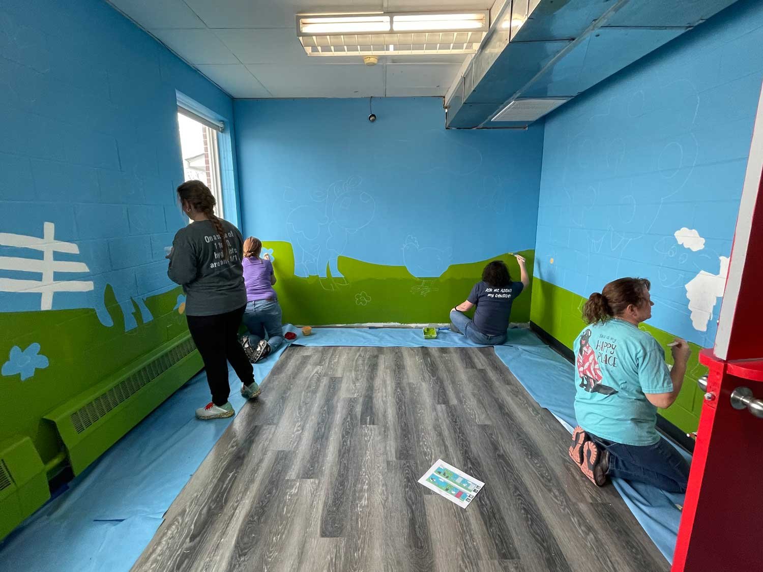 Painting one of the classrooms