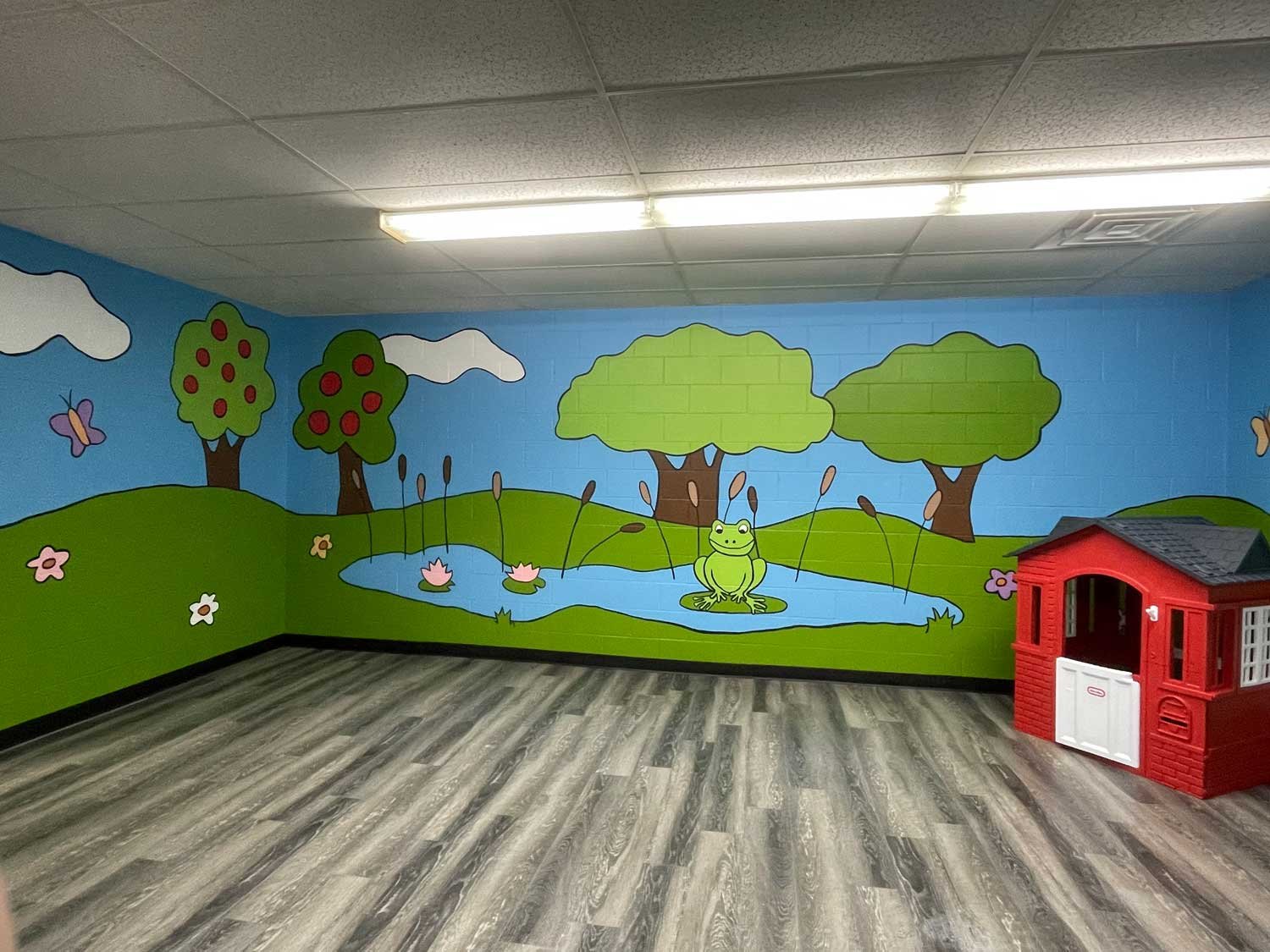 Frogs and lillypads in the pond themed classroom