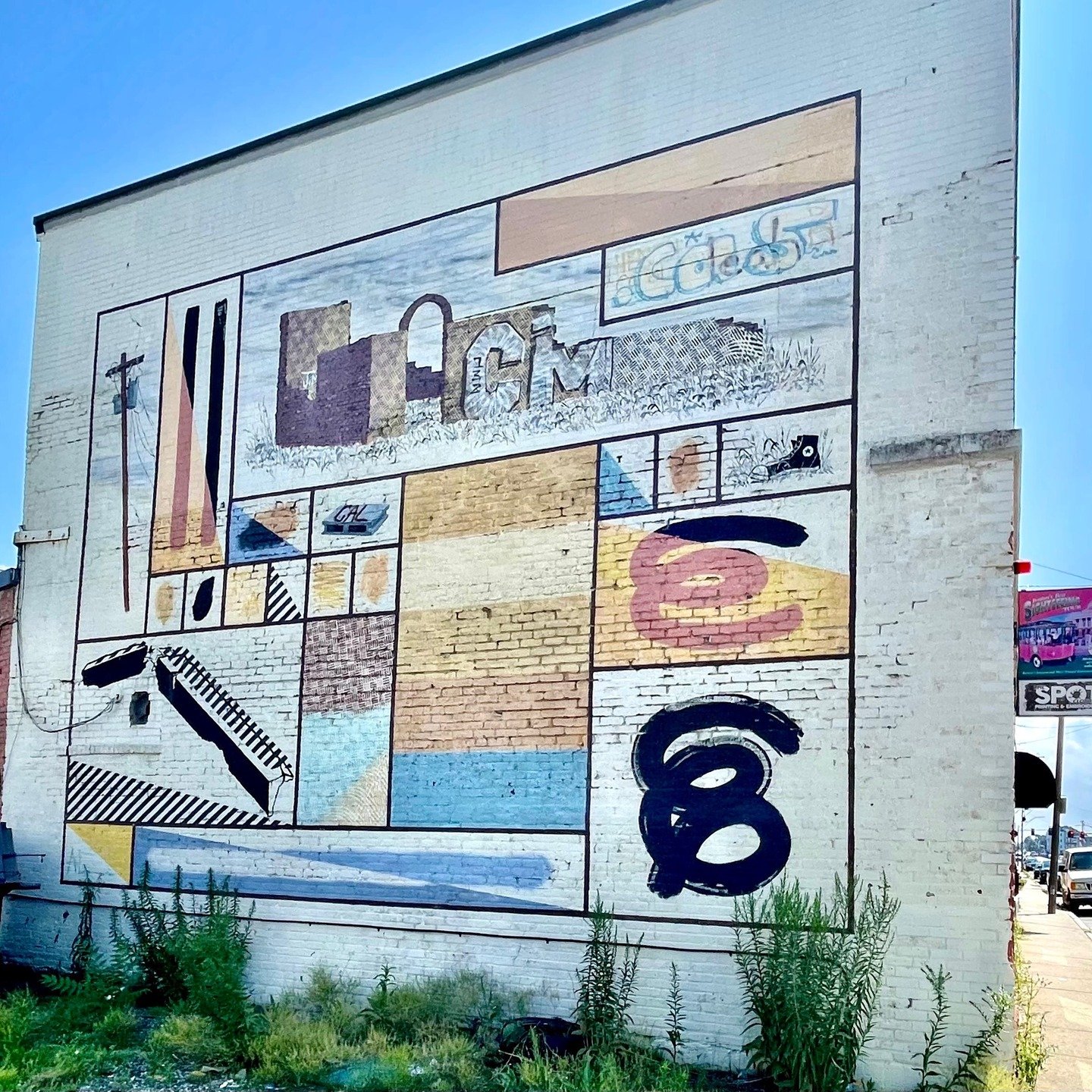 This piece has always been a bit of a mystery to me but I love it every time I ride back and forth (on the various times I've bussed to and from JFK-Broadway). I love the totems represented in the blocky layout. If I were to guess I would say it is a