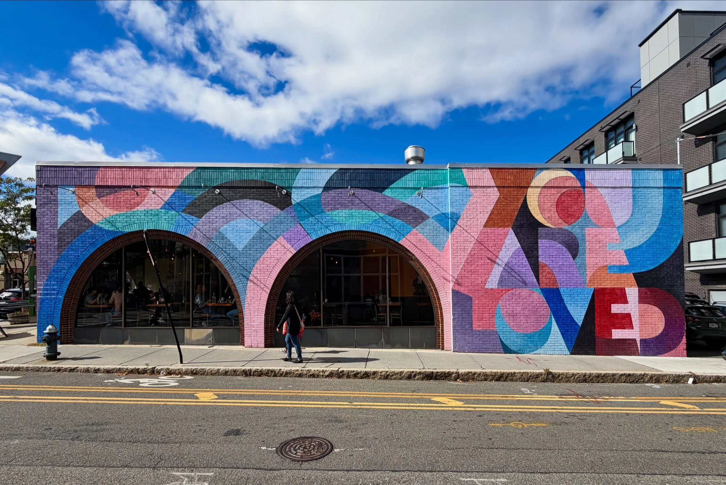 Another absolutely gorgeous addition to the &ldquo;You Are Loved&rdquo; series of murals by Alex Cook, @stonebalancerart . Installed in 2026 this vibrant and uplifting multi-coloured mural is right in Coolidge Corner and is a lovely addition to the n