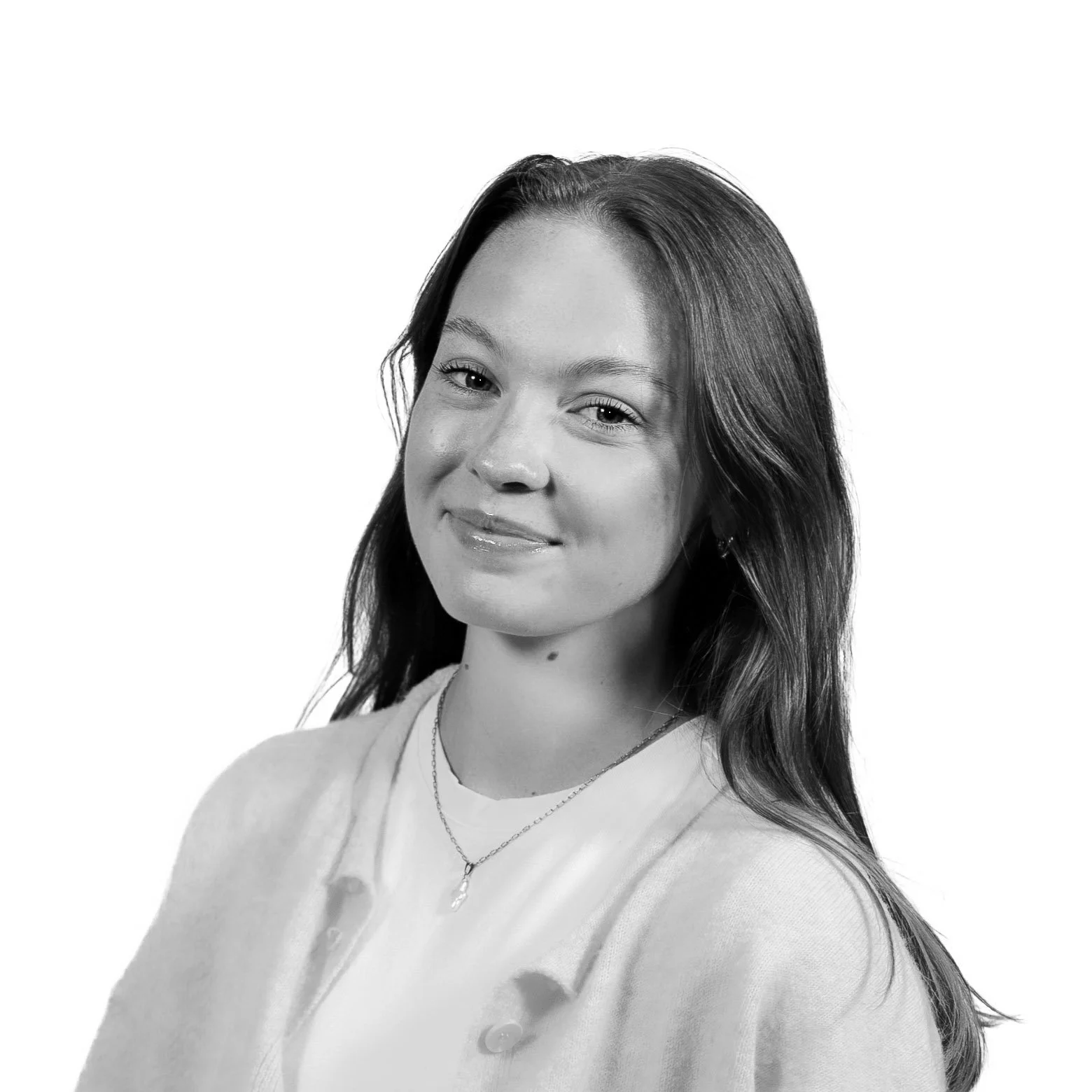 Headshot of Eve Turner standing and angled towards the camera while smiling. 