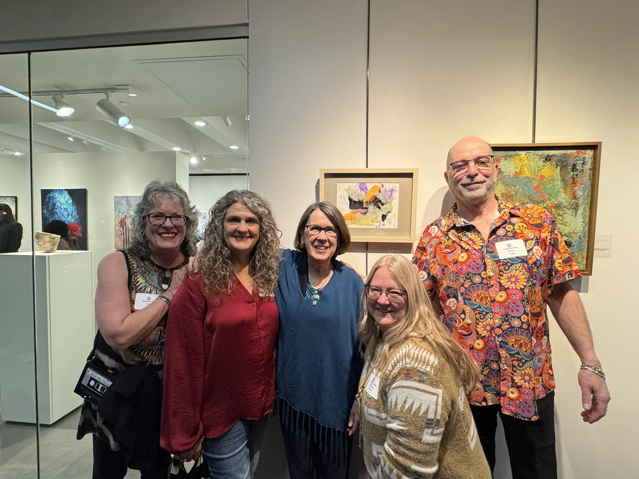 I'm in the center with several of my favorite artists. My entry is the small piece above my head. 