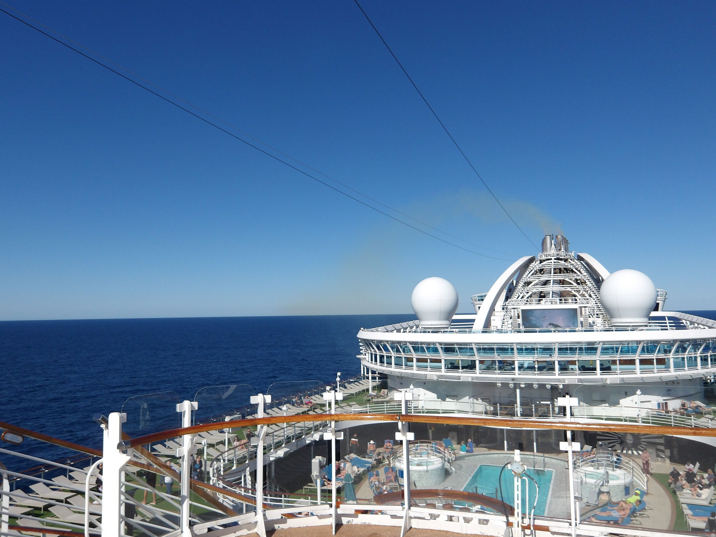 Cruise ship sailing at sea — the natural containment of a ship retreat means your clients are fully present, with nowhere else to be.