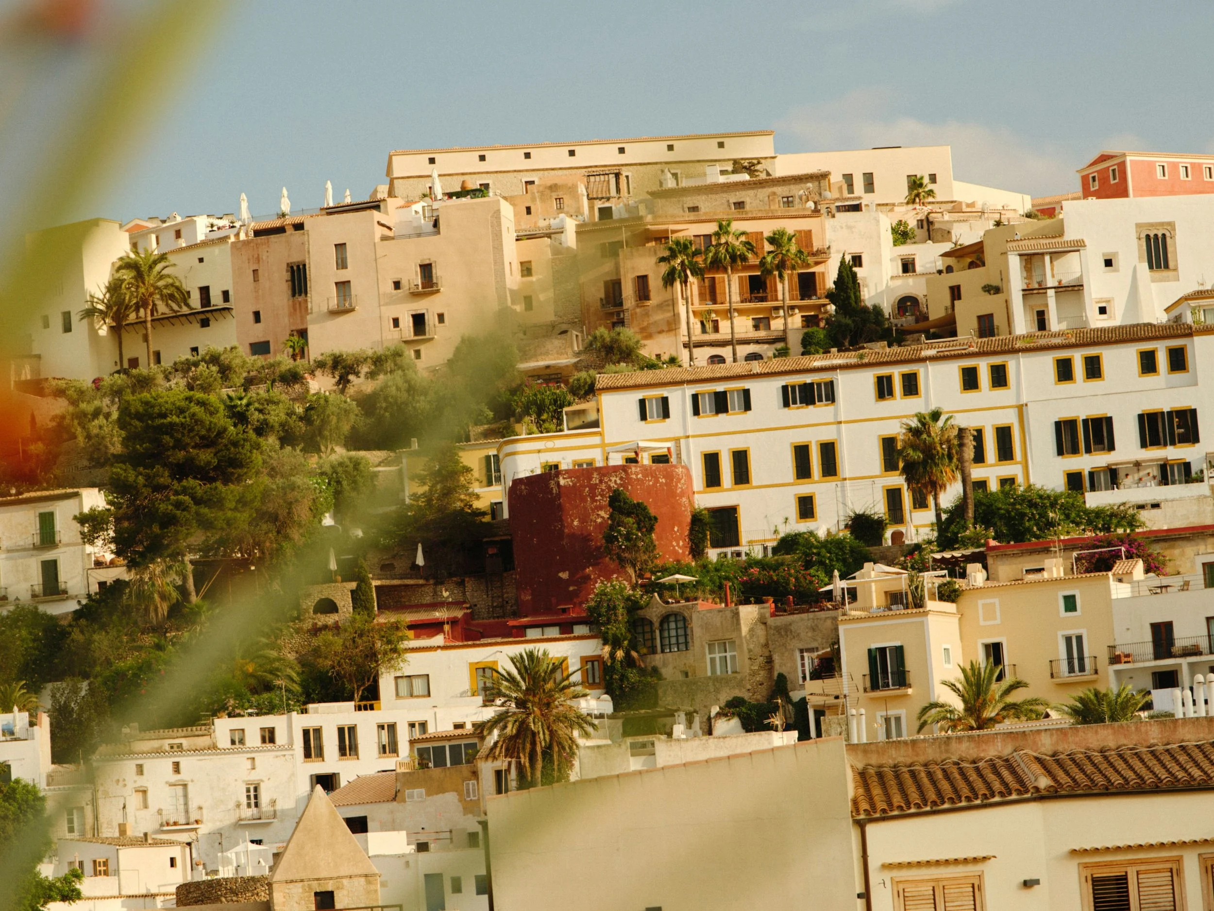 Ibiza old town at golden hour with warm evening light