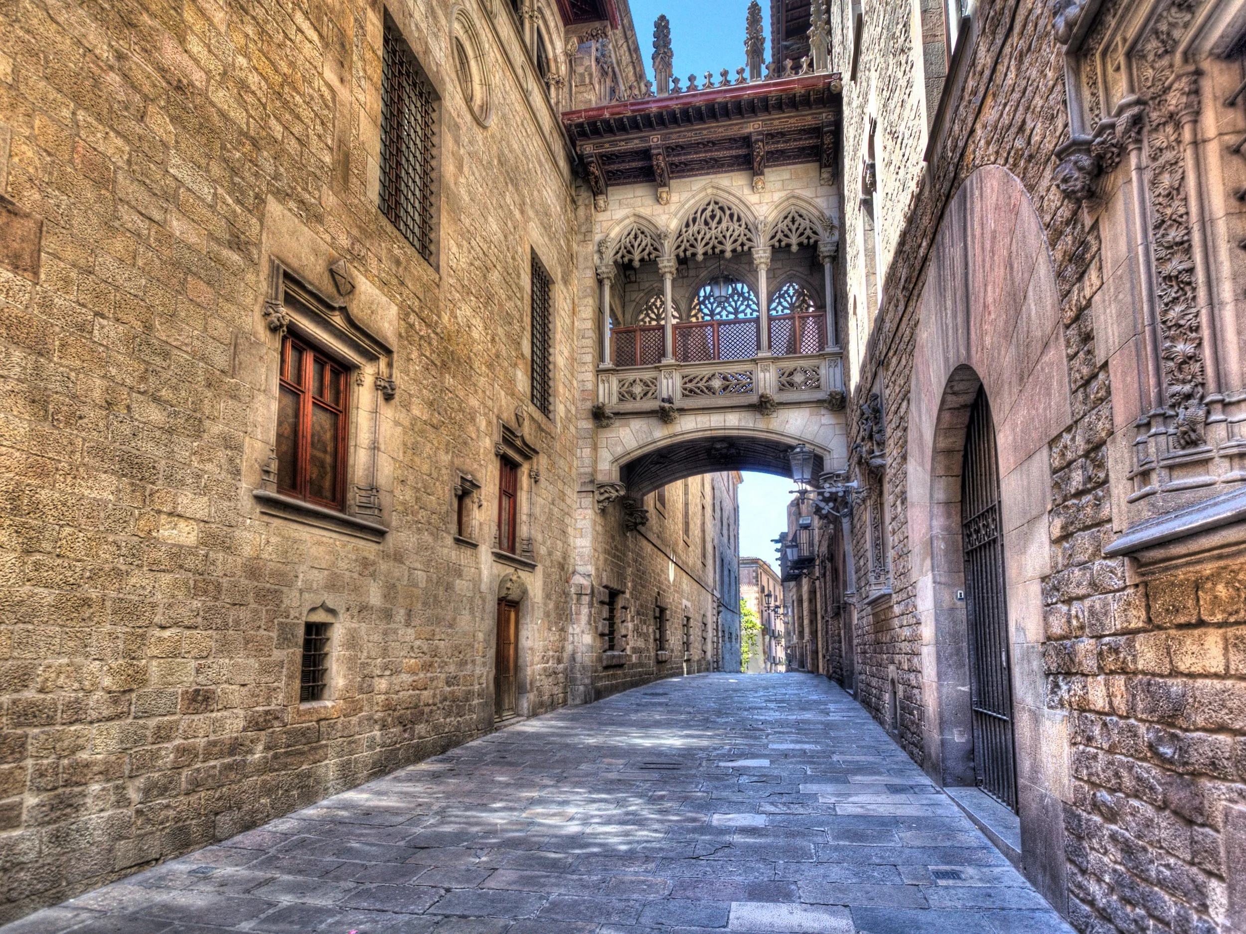 Quiet cobblestone street in Barcelona old town in winter morning light