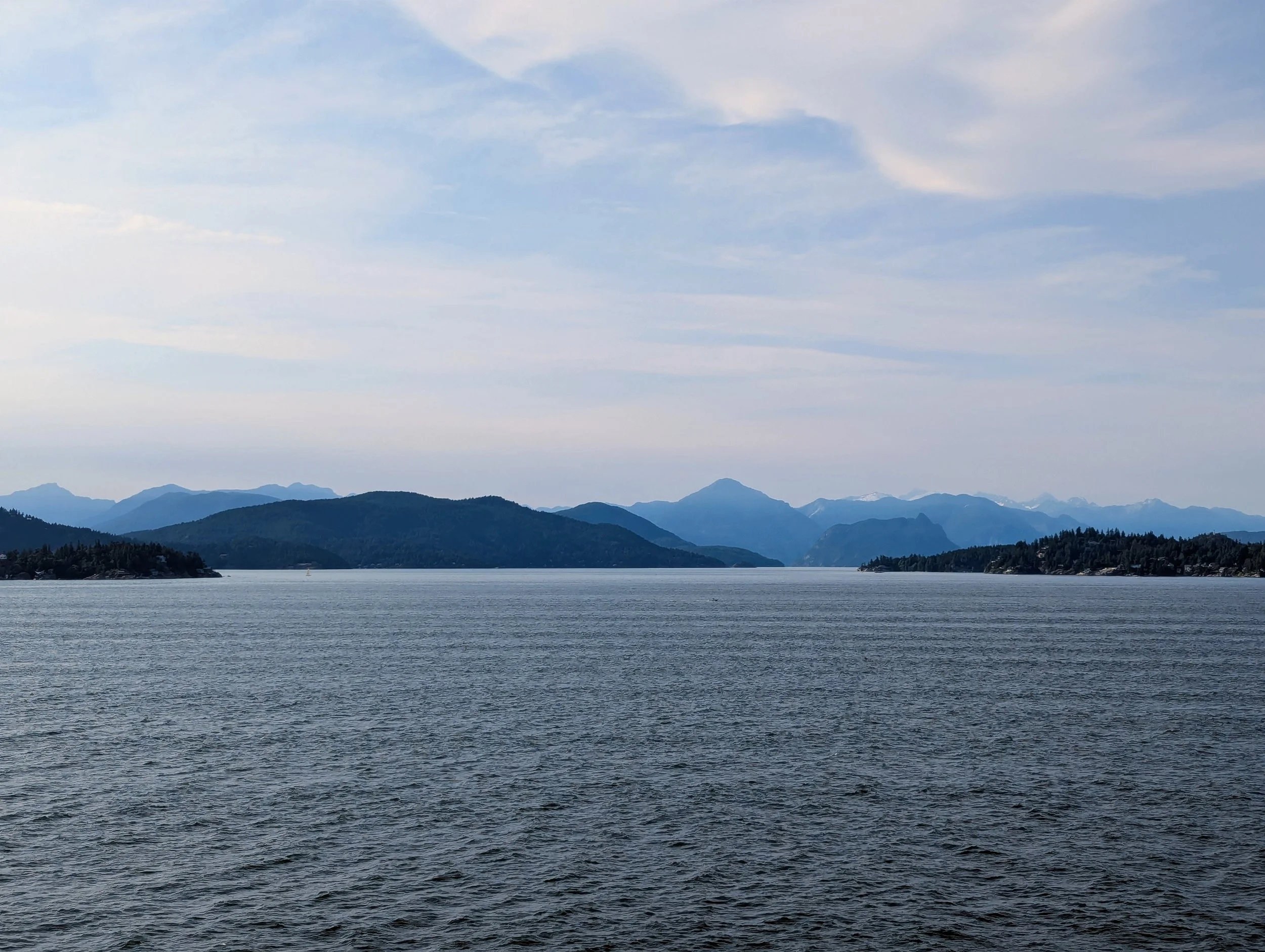 Alaska Inside Passage viewed from cruise ship showing dramatic coastal scenery and mountains