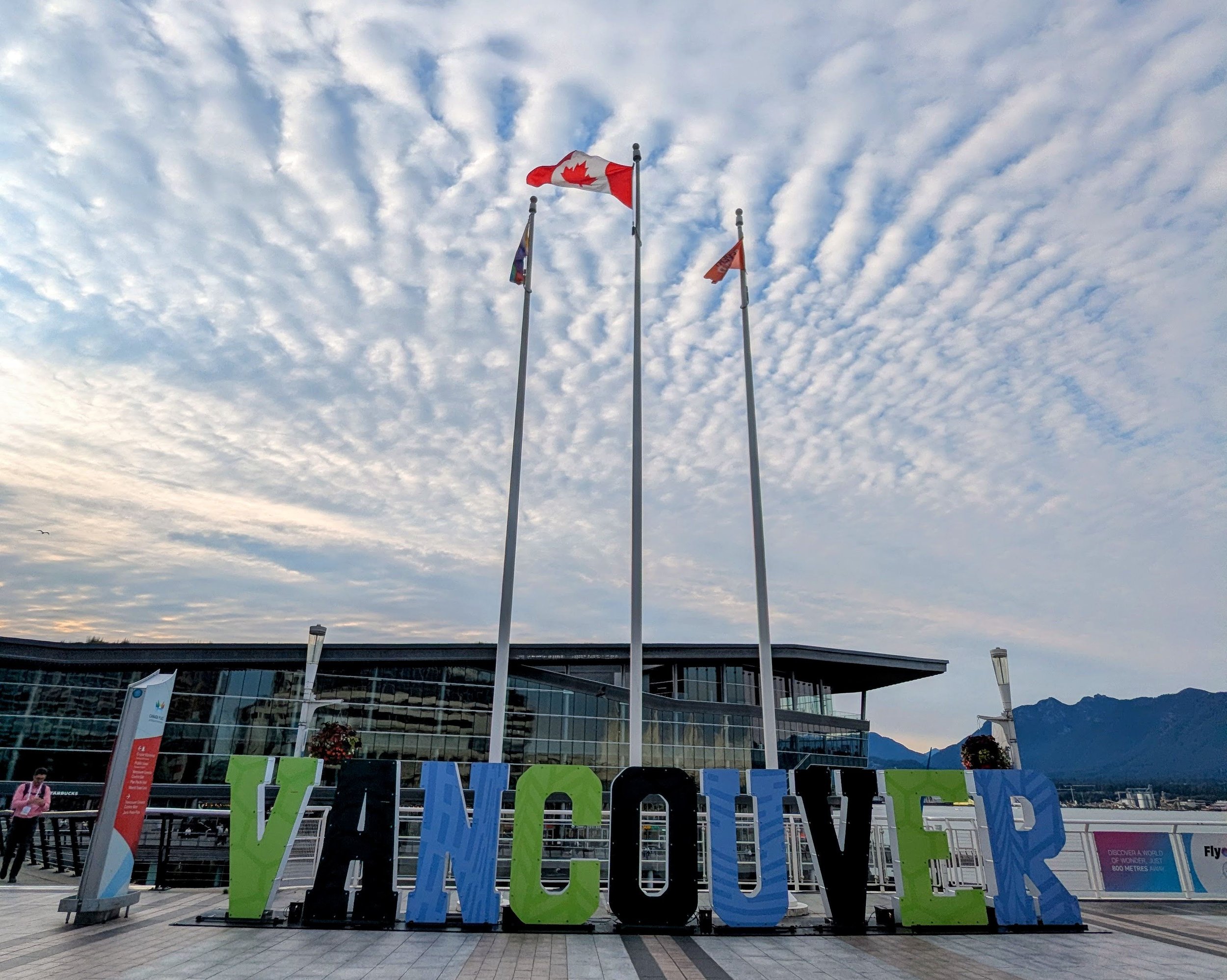 Large sign speling Vancouver at Canada Place, where you board your ship