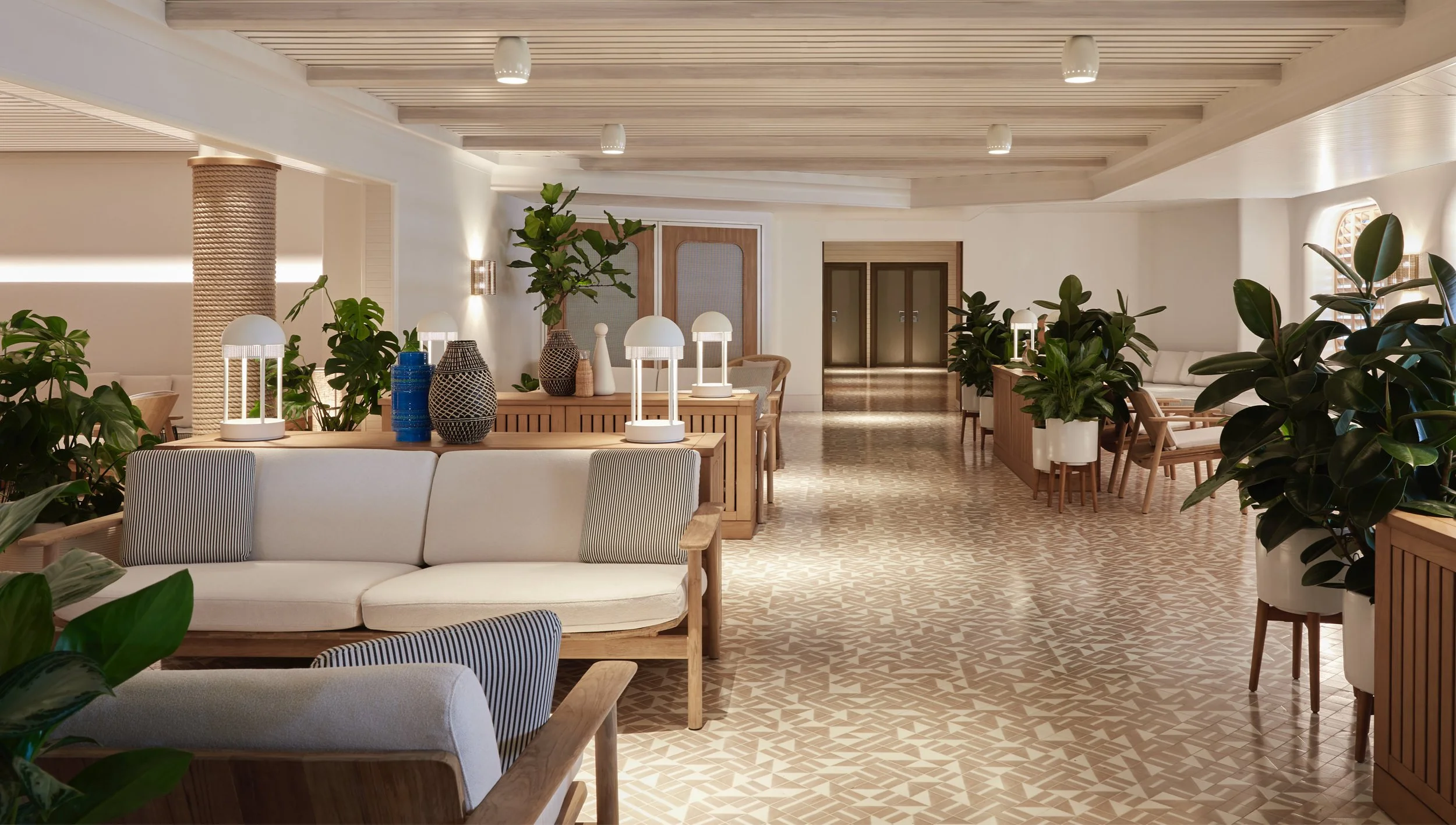 The Dock House - one of the Scarlet Lady's distinctive lounge or dining spaces — the kind of environment that makes in-between retreat time feel intentional rather than empty.