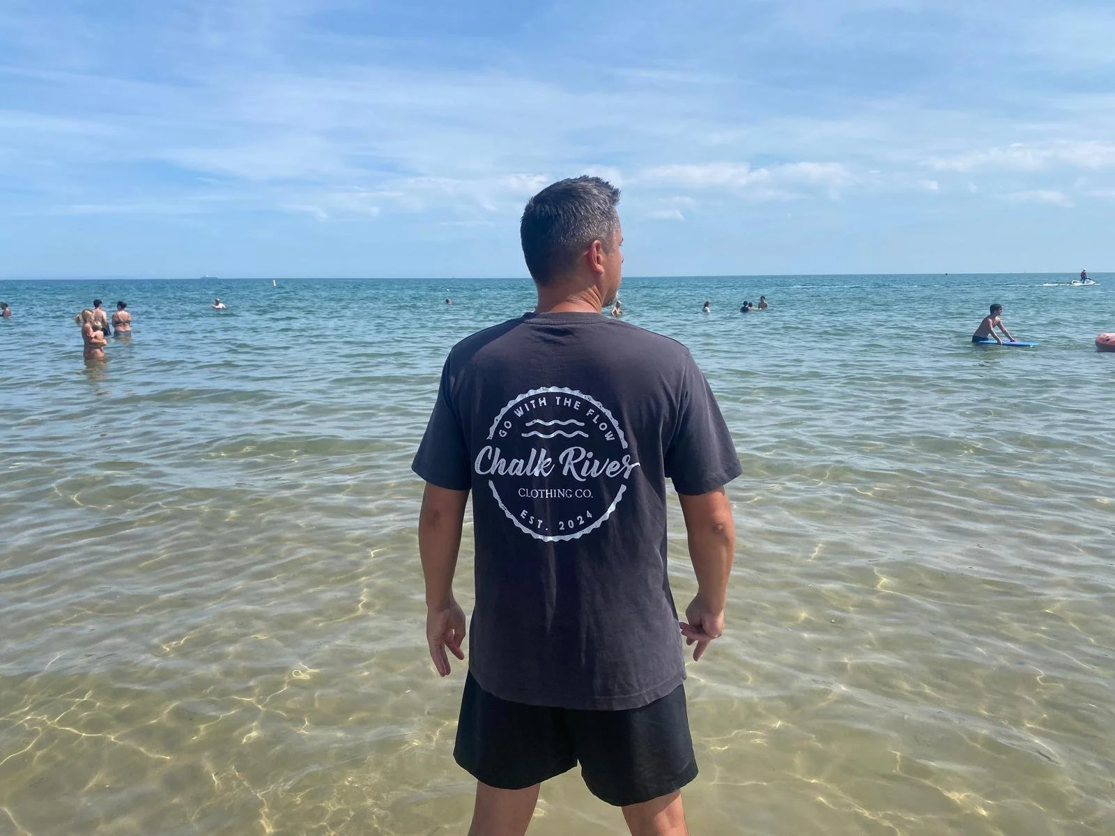 Chalk River Tshirt on the beach.jpeg
