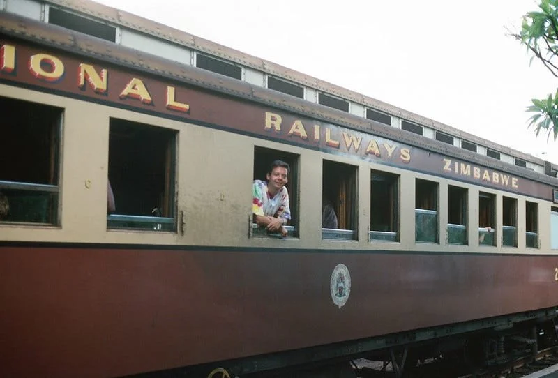 Me (1990) on a 1952 Zimbabwe National Railway sleeper car from Harare to Victoria Falls. All images are in the public domain.