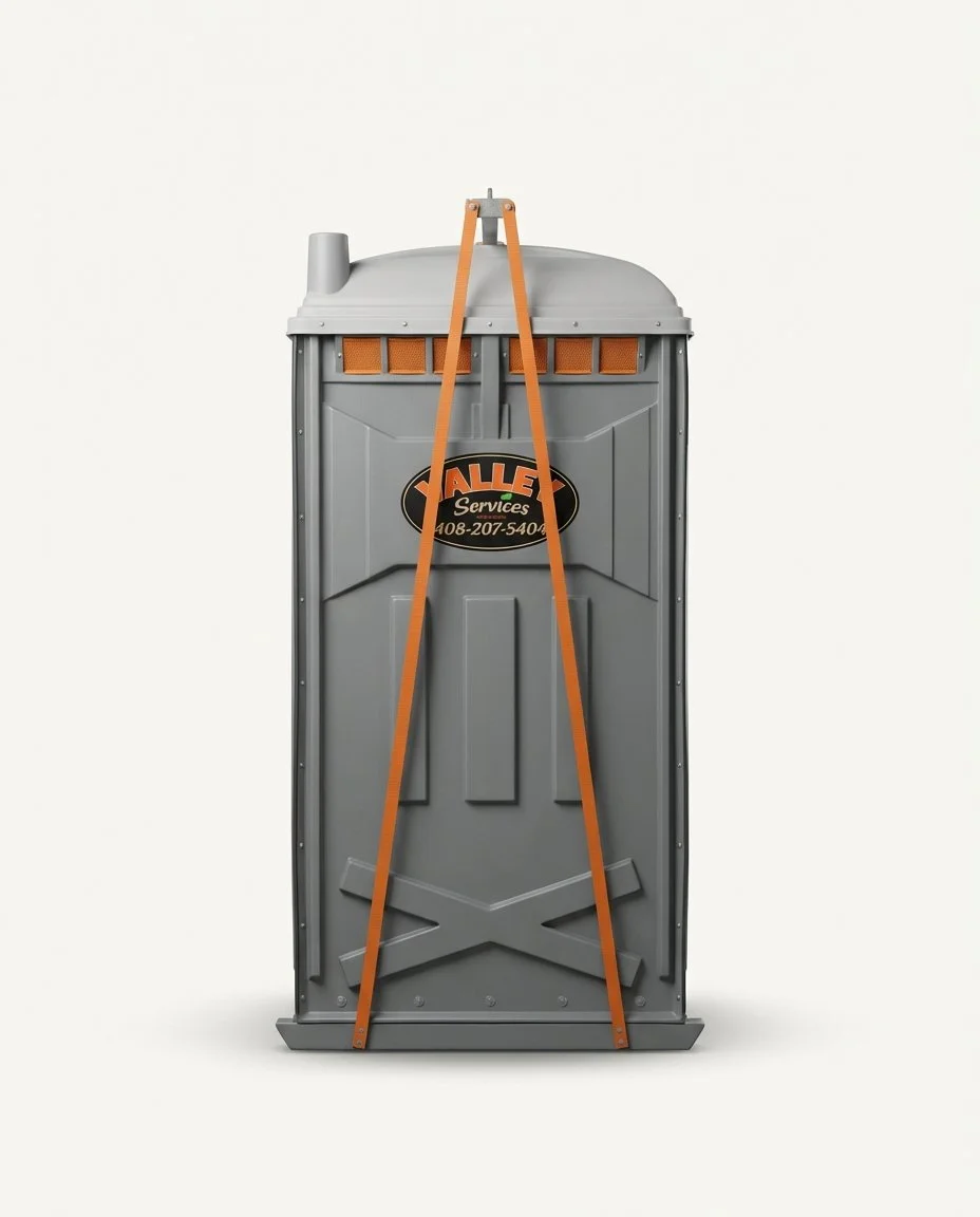Row of portable toilets in an outdoor setting.