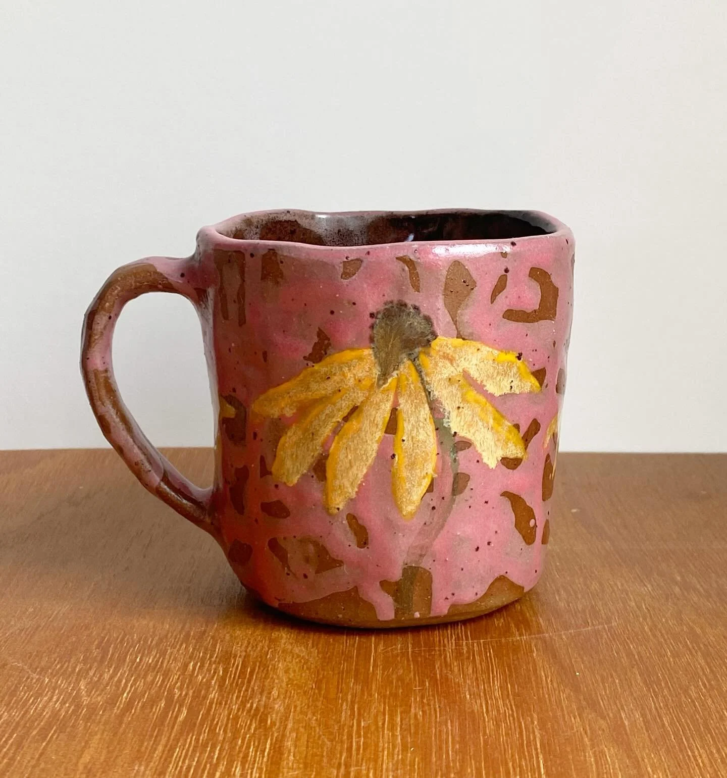 Long held idea inspired by a birthday bouquet (thanks @roo.roo.lucia) of pink dahlia and black eyed susan. At first I thought it was too busy, but the more I looked, the more I liked it. I like a mug with texture and multiple elements so that you can