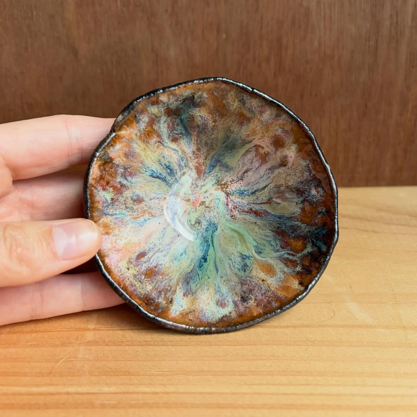 Glaze magic.
Bowl was made from whatever was left on my brush