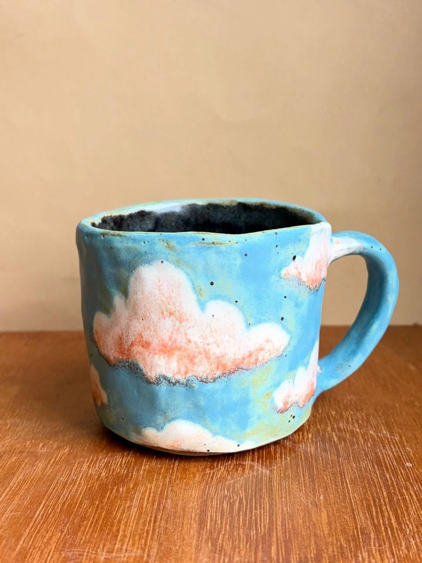 A cloud mug that I&rsquo;m pleased with! The clouds really pop.  Oh and a surprise daffodil at the end because they match! #pinchpot #handbuiltpottery