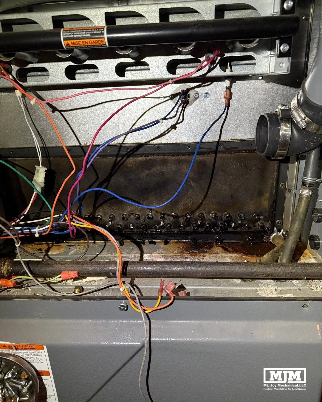 During inspection, significant corrosion and deterioration were found inside the furnace's heat exchanger assembly.

Damage like this can compromise safe furnace operation and is one of the most common reasons older heating systems require replacemen