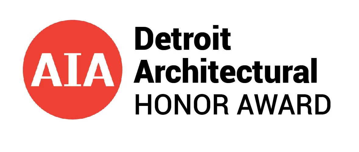 Logo for the AIAs Detroit Architectural Honor Award, featuring a red circle with the white text 'AIA' inside and the words 'Detroit Architectural Honor Award' next to it.