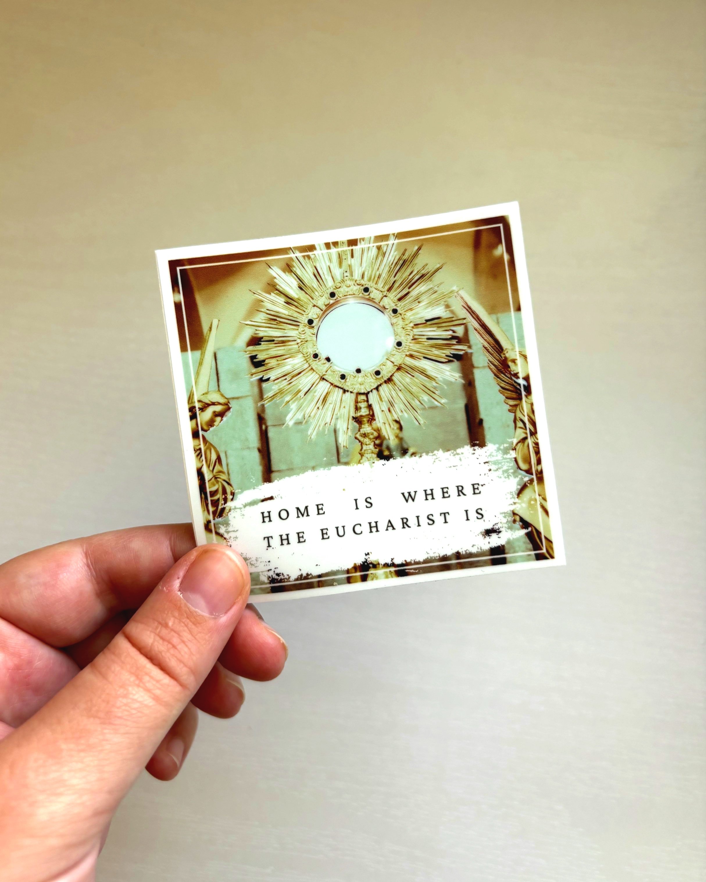 Eucharist+sticker+%E2%80%93%C2%A0hand+pic.jpg
