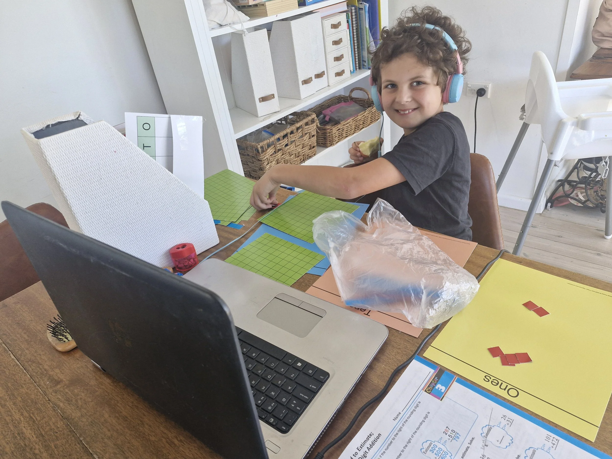 Luke doing BJU Press Math 3 with manipulatives. He’s using the Online with Books version where you get online streaming with physical workbooks and manipulatives.