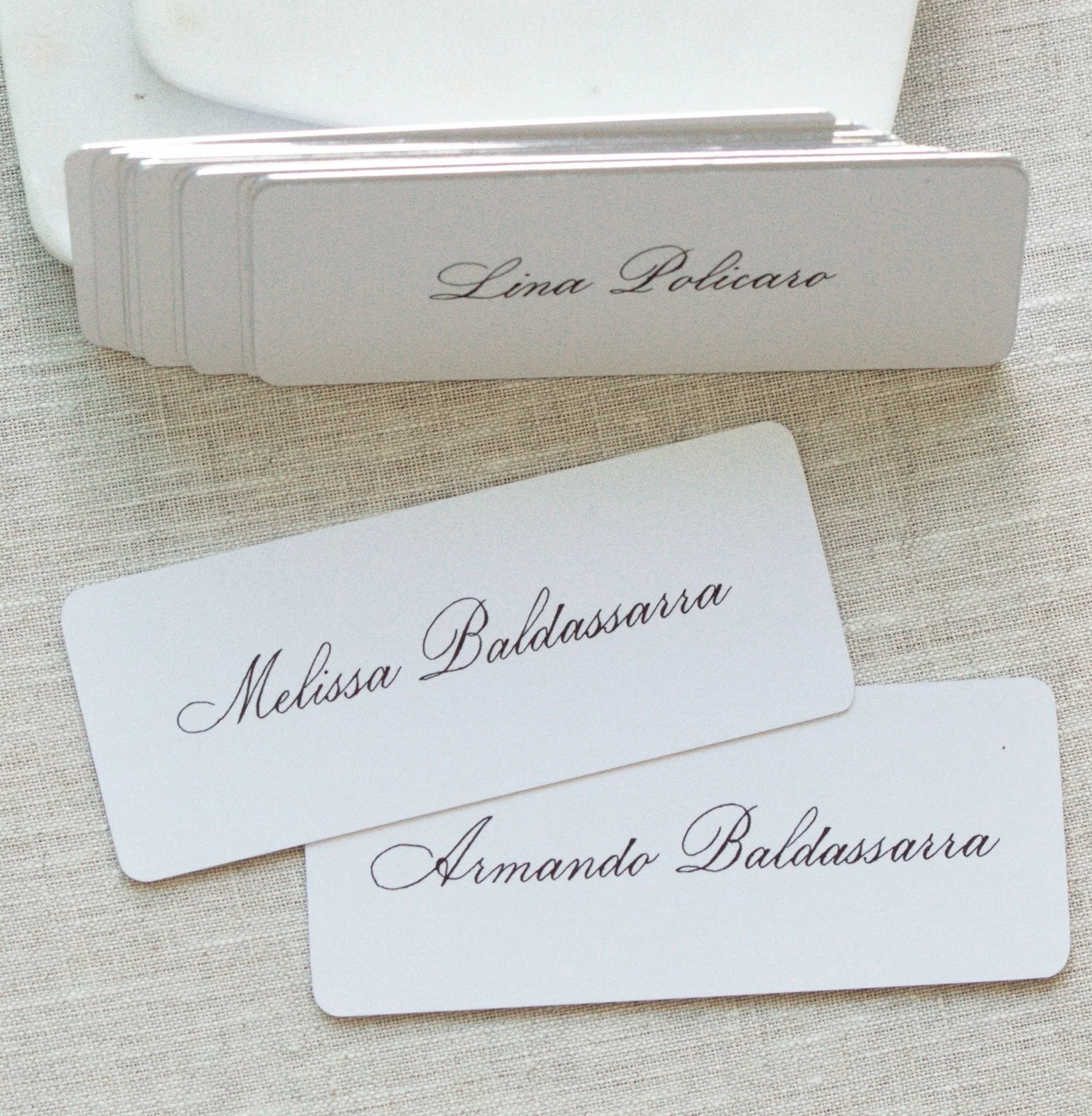 Handwritten calligraphy place cards for a Dior VIP dinner event