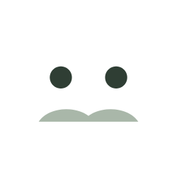 A minimalist face with two black eyes and a simple curved mouth.