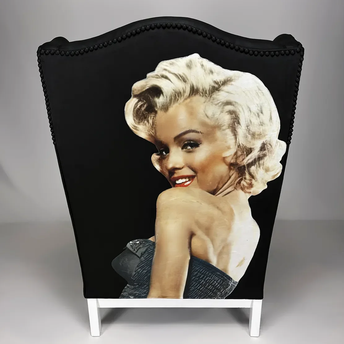Decorative panel featuring a vintage-style portrait of Marilyn Monroe with platinum blonde hair, red lipstick, and a black strapless dress, set against a black background.