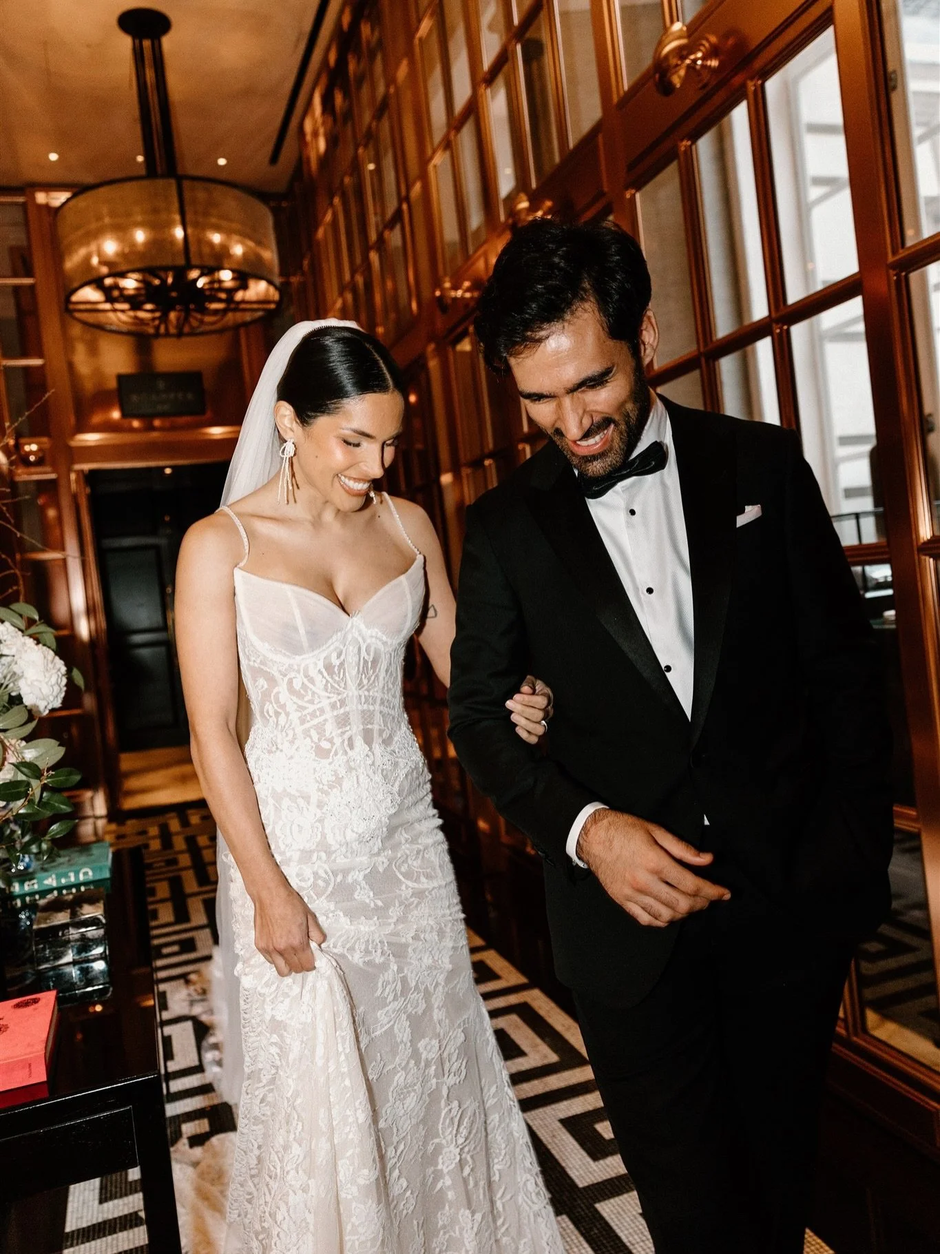 Here's a sign to listen to your photographer and get some cool shots in the evening. 

By this point you may have changed into a second dress, had some champagne and your feeling on cloud 9. It may only be for 5/10 mins but honestly these type of sho