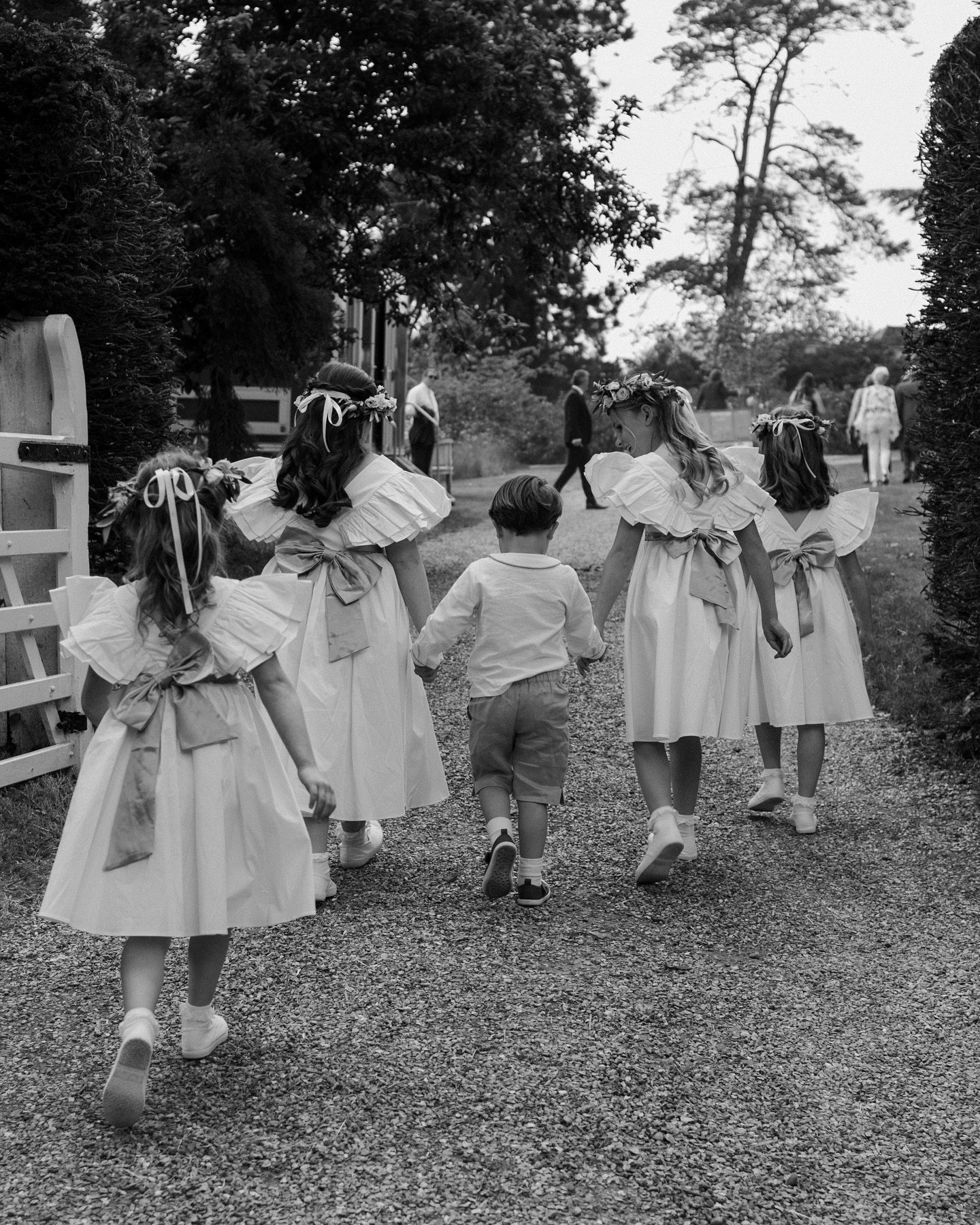 A beautiful moment from a beautiful garden wedding. All the little's walking from the church to the drinks reception! Cuteness overload