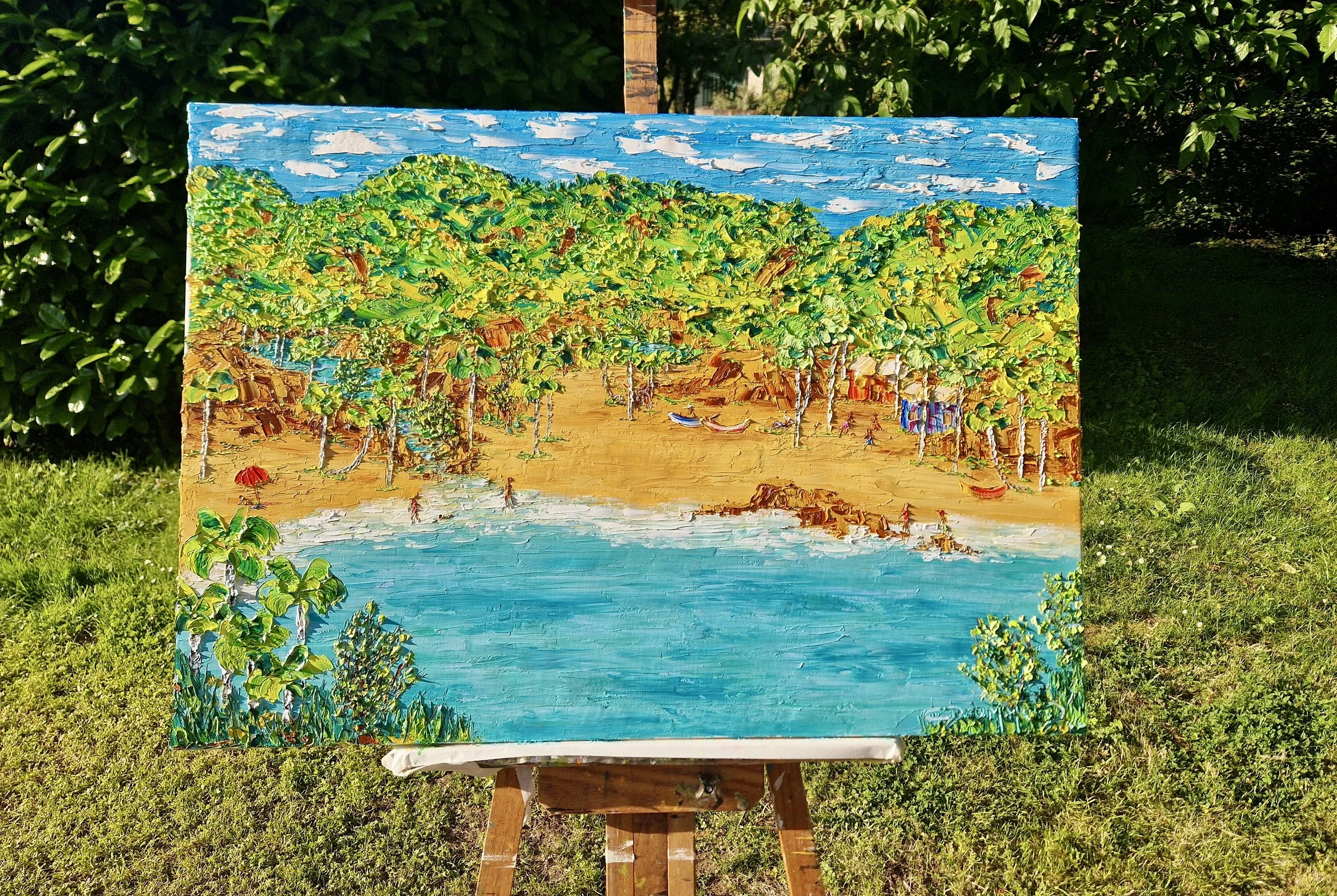 Paraíso Secreto on easel outdoors – tropical beach painting inspired by Ilha Grande, Brazil, oil on canvas by Christine Drummond