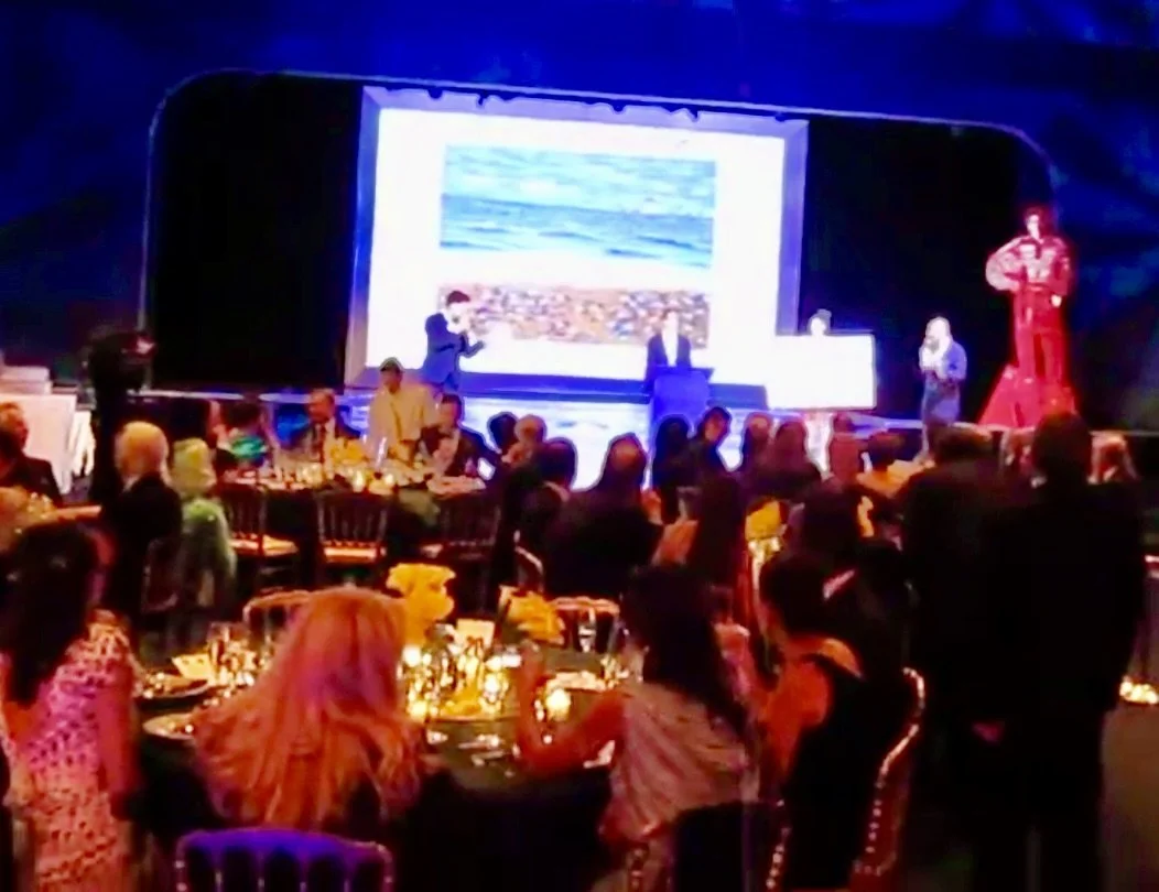 Domingo na Praia do Pepe by Christine Drummond displayed during the Brazilian Night in Monaco charity auction honoring Ayrton Senna in 2014.