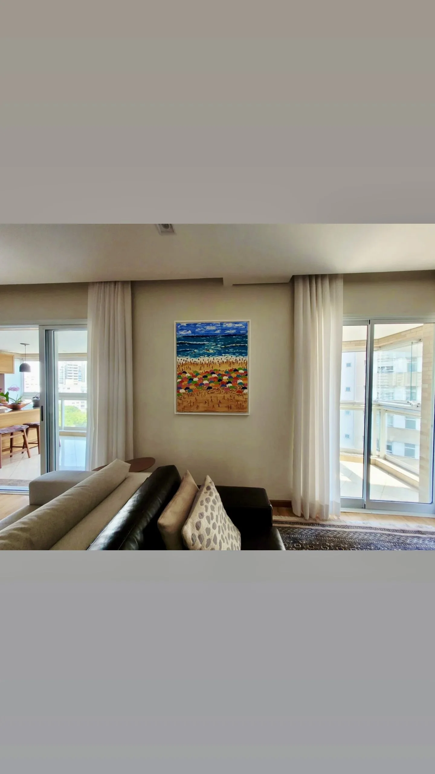 Partiu Praia by Christine Drummond displayed in a contemporary apartment living room in São Paulo, Brazil.