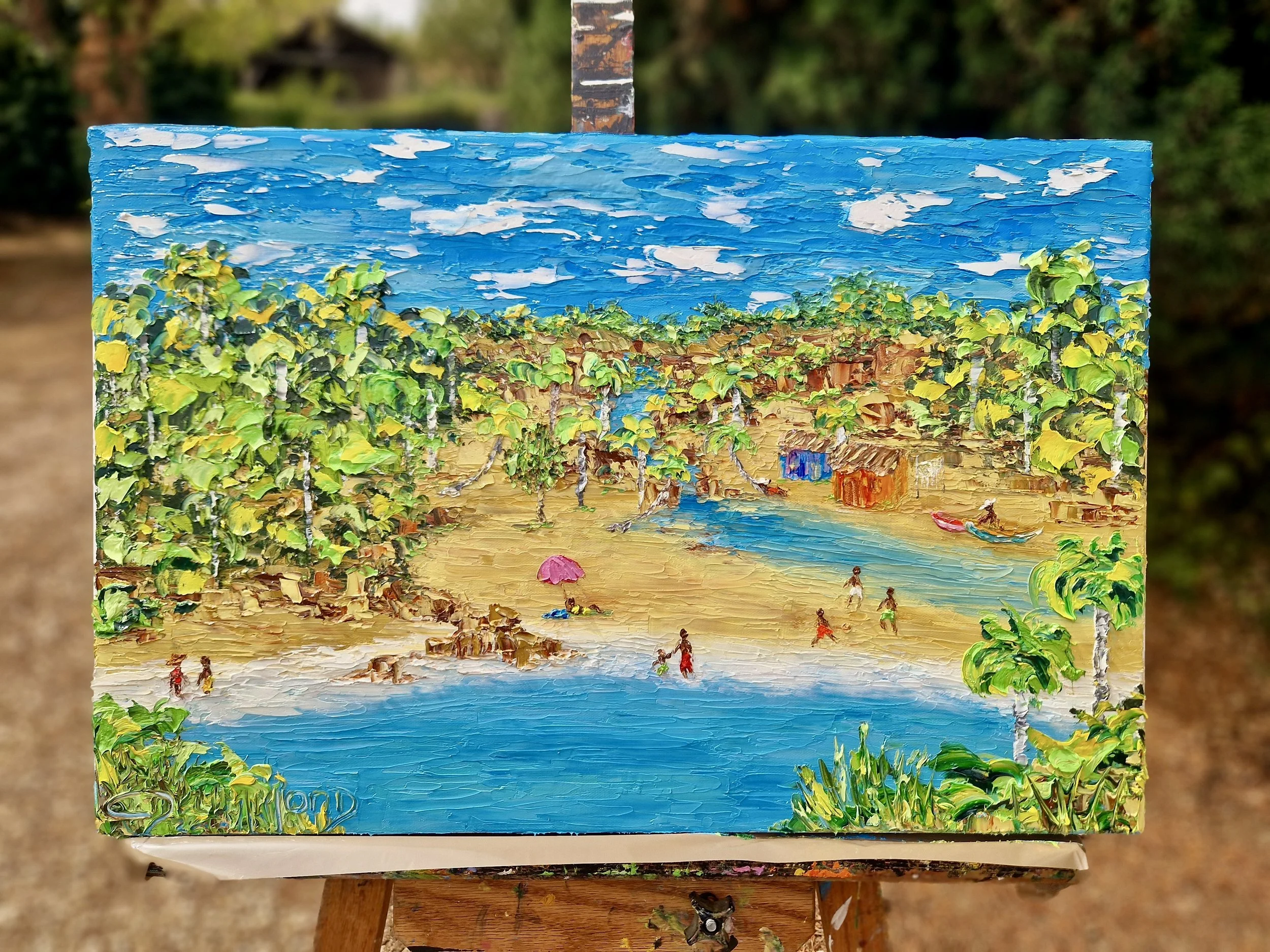 Vivendo no Paraíso tropical beach painting by Christine Drummond displayed on an easel