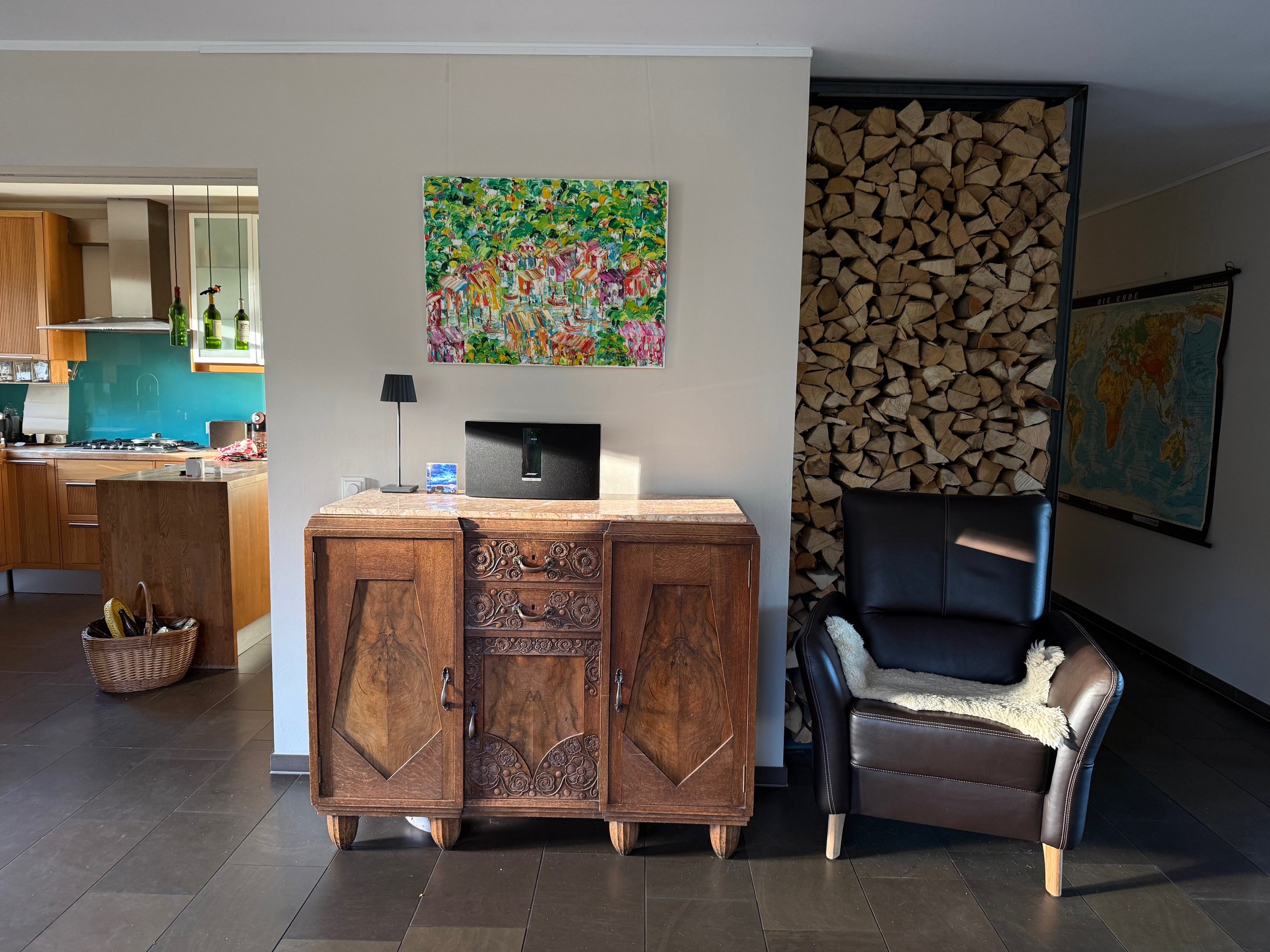 Christine Drummond favela painting Pura Vida displayed in warm contemporary collector interior in Germany