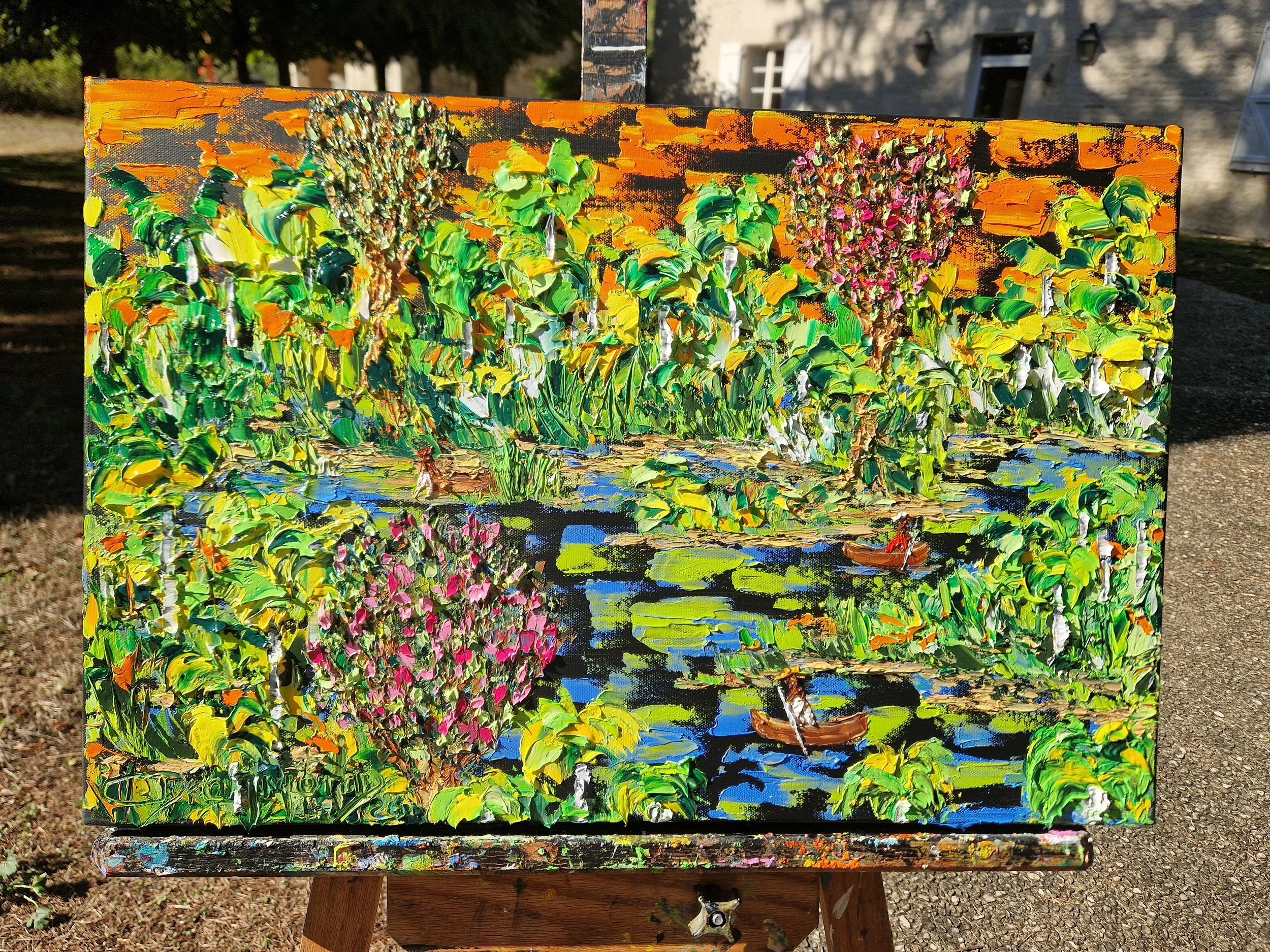 Encantos da Natureza Pantanal painting by Christine Drummond on easel.