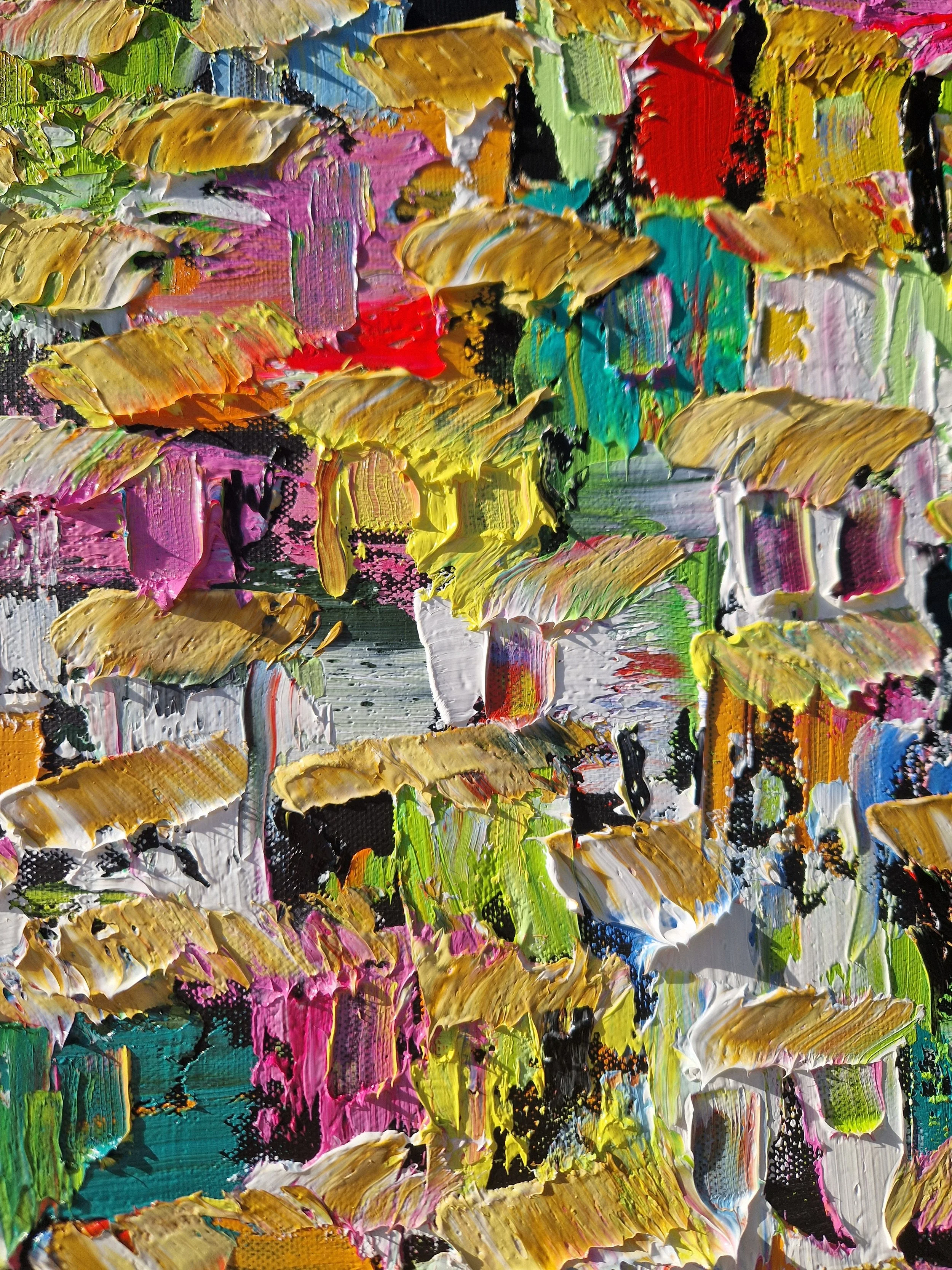 Close-up of Por Entre as Vielas by Christine Drummond, showing overlapping golden rooftops, colourful favela houses in pink, green and turquoise, and thick palette-knife oil textures.