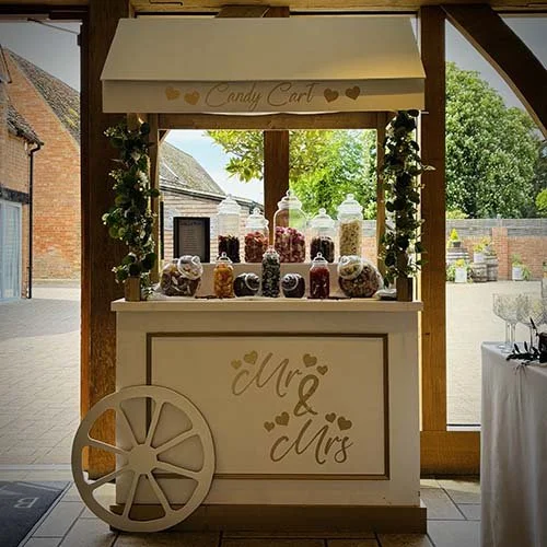 Personalised Candy Cart with Sweets supplied for a wedding at Bassmead Manor in St Neots, Cambridge 