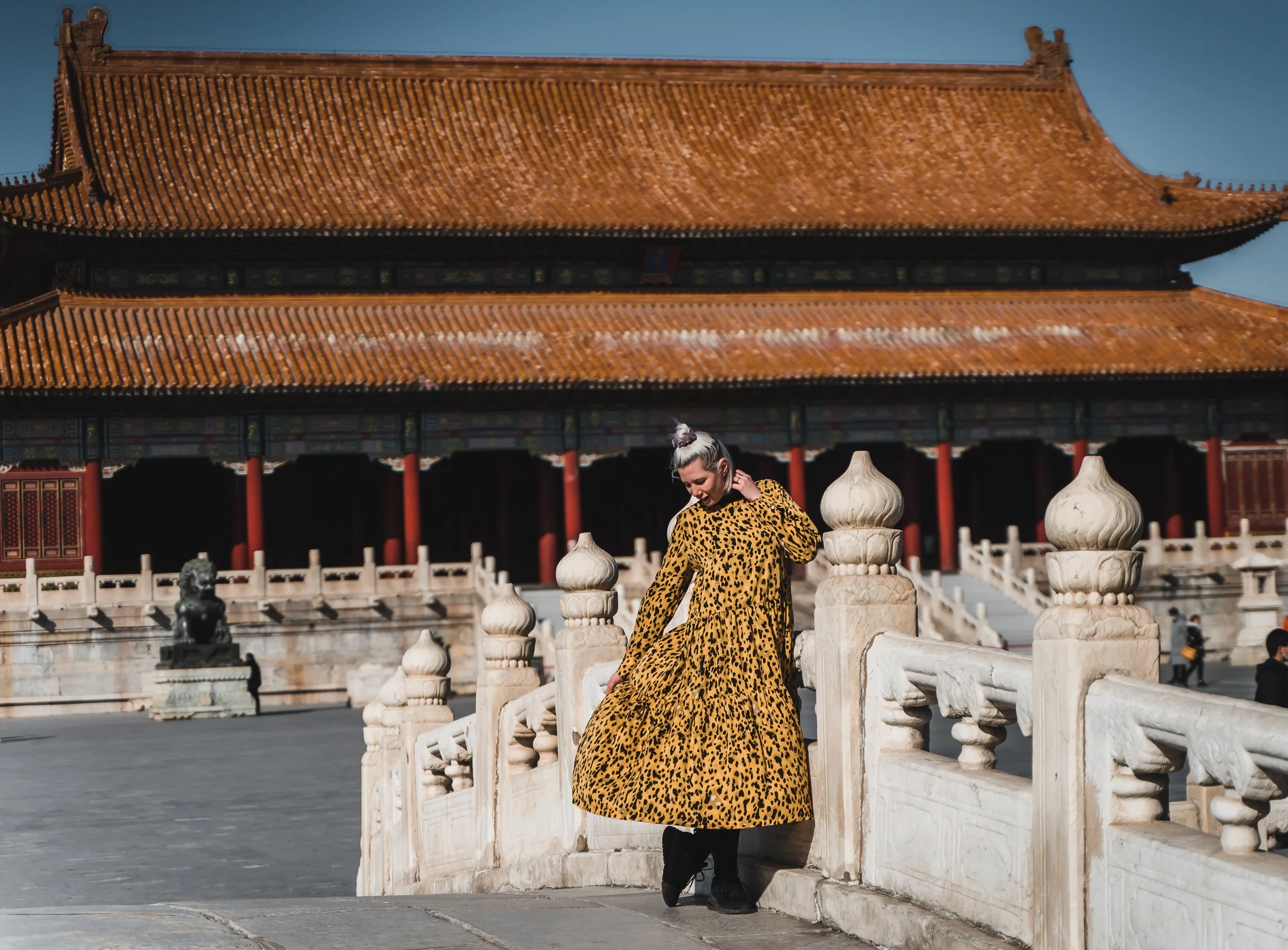 Girl standing outside The Forbidden City in Beijing